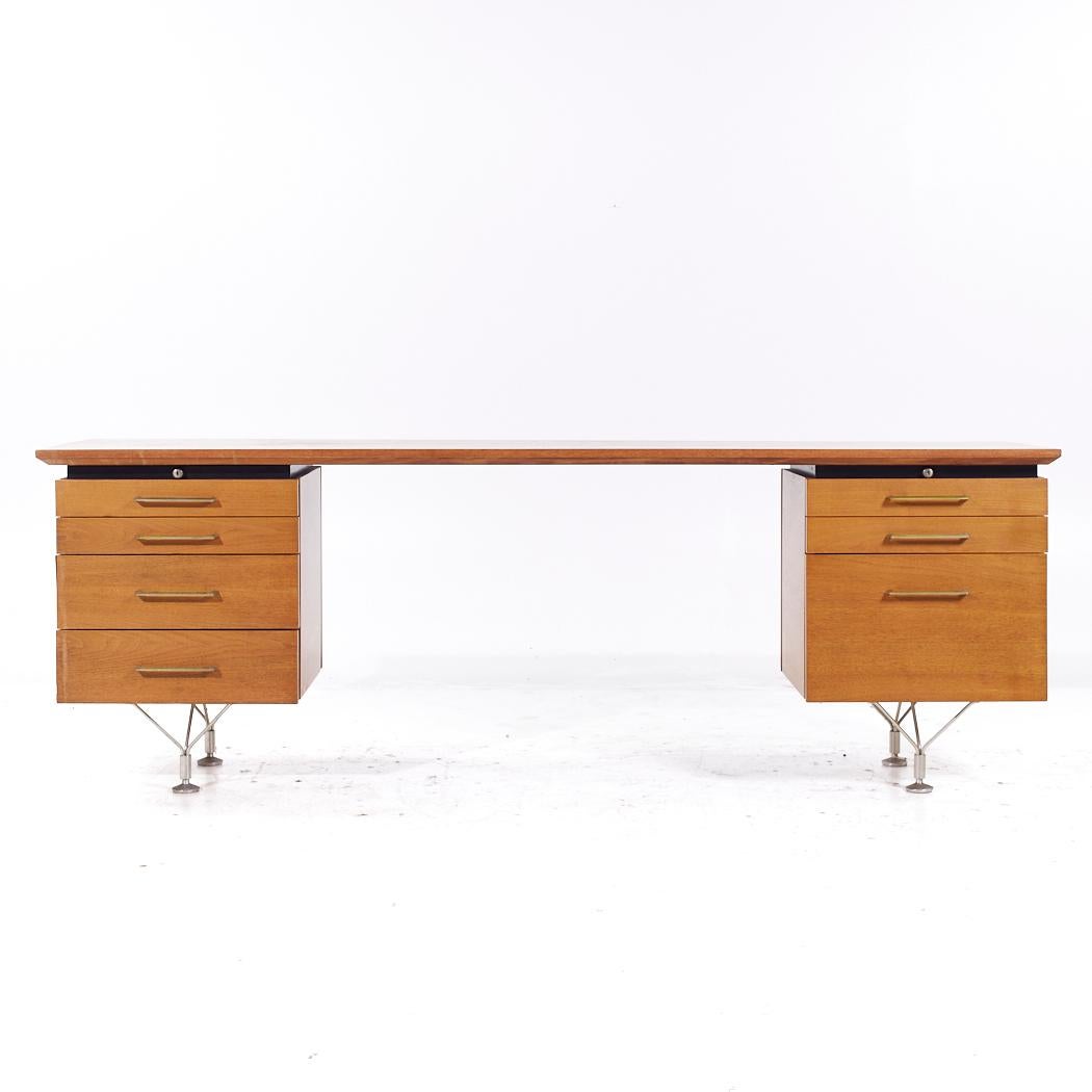 Stow Davis Mid Century Brass and Walnut Credenza

This credenza measures: 84.25 wide x 21 deep x 29 inches high, with a chair clearance of 27.5 inches

All pieces of furniture can be had in what we call restored vintage condition. That means the