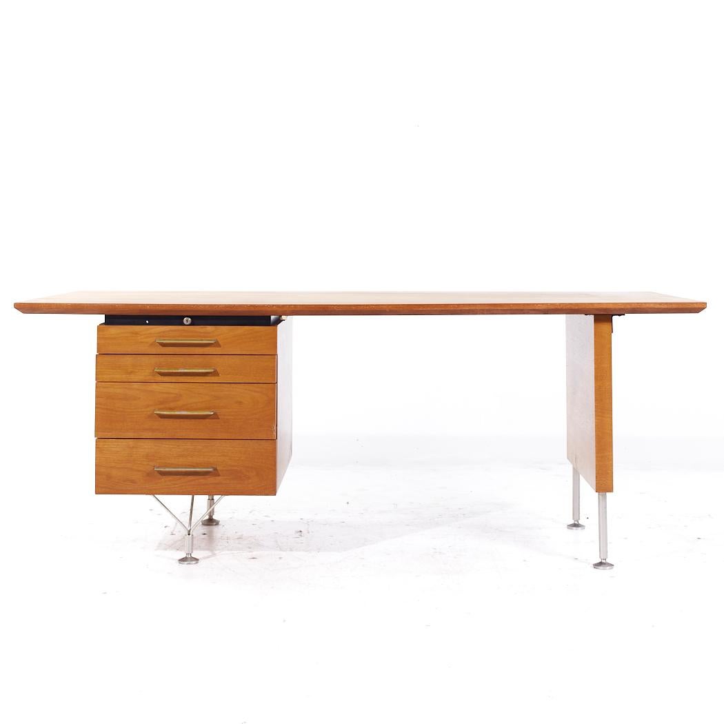 Stow Davis Mid Century Walnut and Brass Desk

This desk measures: 76 wide x 36 deep x 29 high, with a chair clearance of 28 inches

All pieces of furniture can be had in what we call restored vintage condition. That means the piece is restored upon