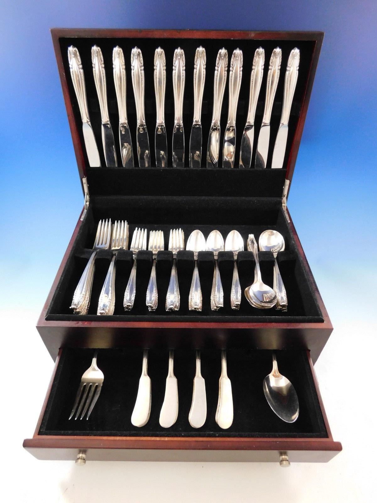 Stradivari by Wallace sterling silver dinner size flatware set - 74 pieces. This set includes:

12 dinner size knives, 9 3/4