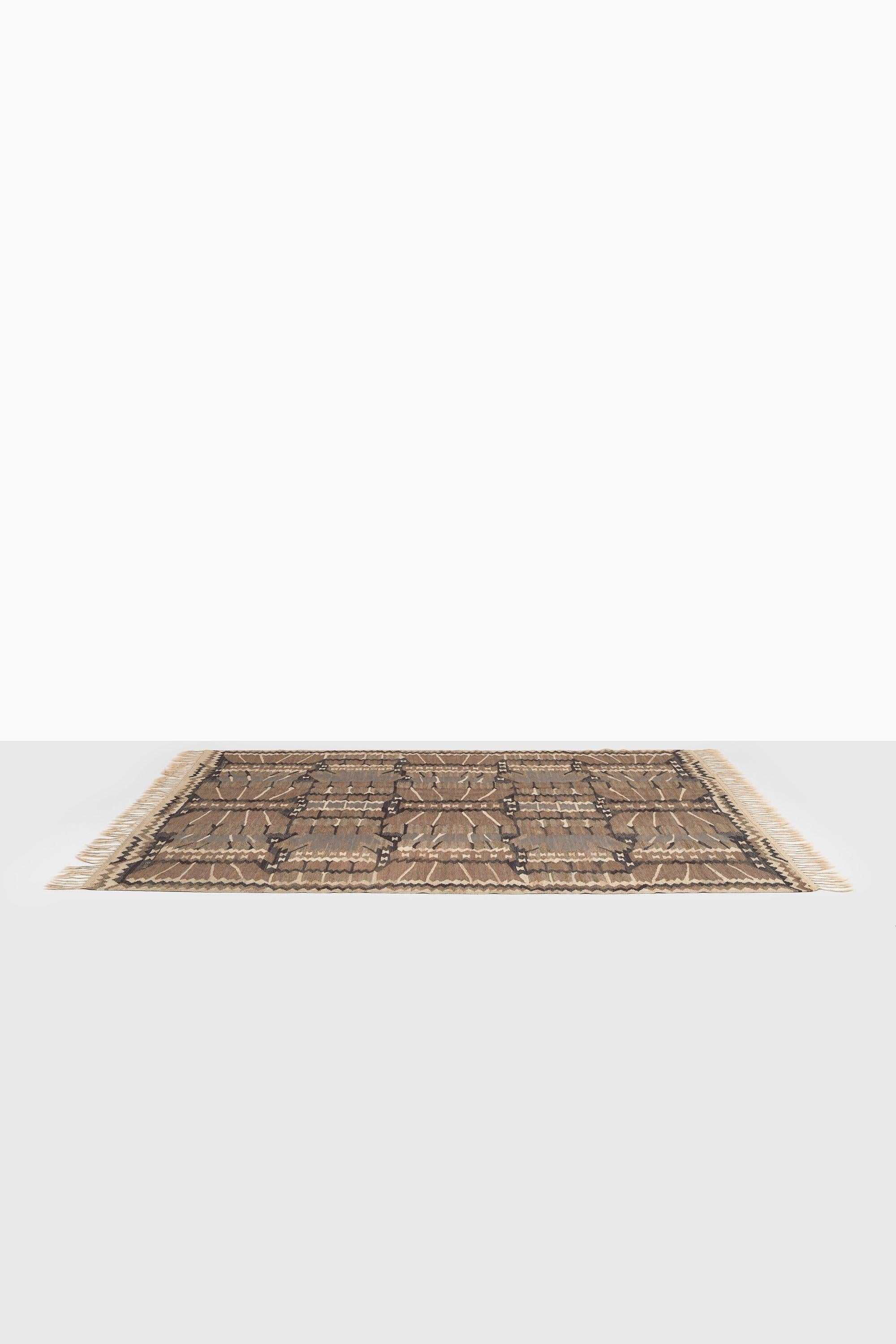 ‘Strålblomman Grå’ Carpet by Barbro Nilsson, 1952

Additional Information:
Style: Mid century, Scandinavian
Produced by Märta Måås-Fjetterström AB in Sweden
Dimensions (W x D): 290 x 218 cm
Signature initials “BN” for Barbro Nilsson alongside “MMF”