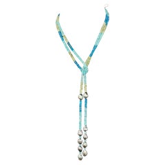 Strand of Apatite Tahitian Pearl Tassel Necklace 50 Inches Long