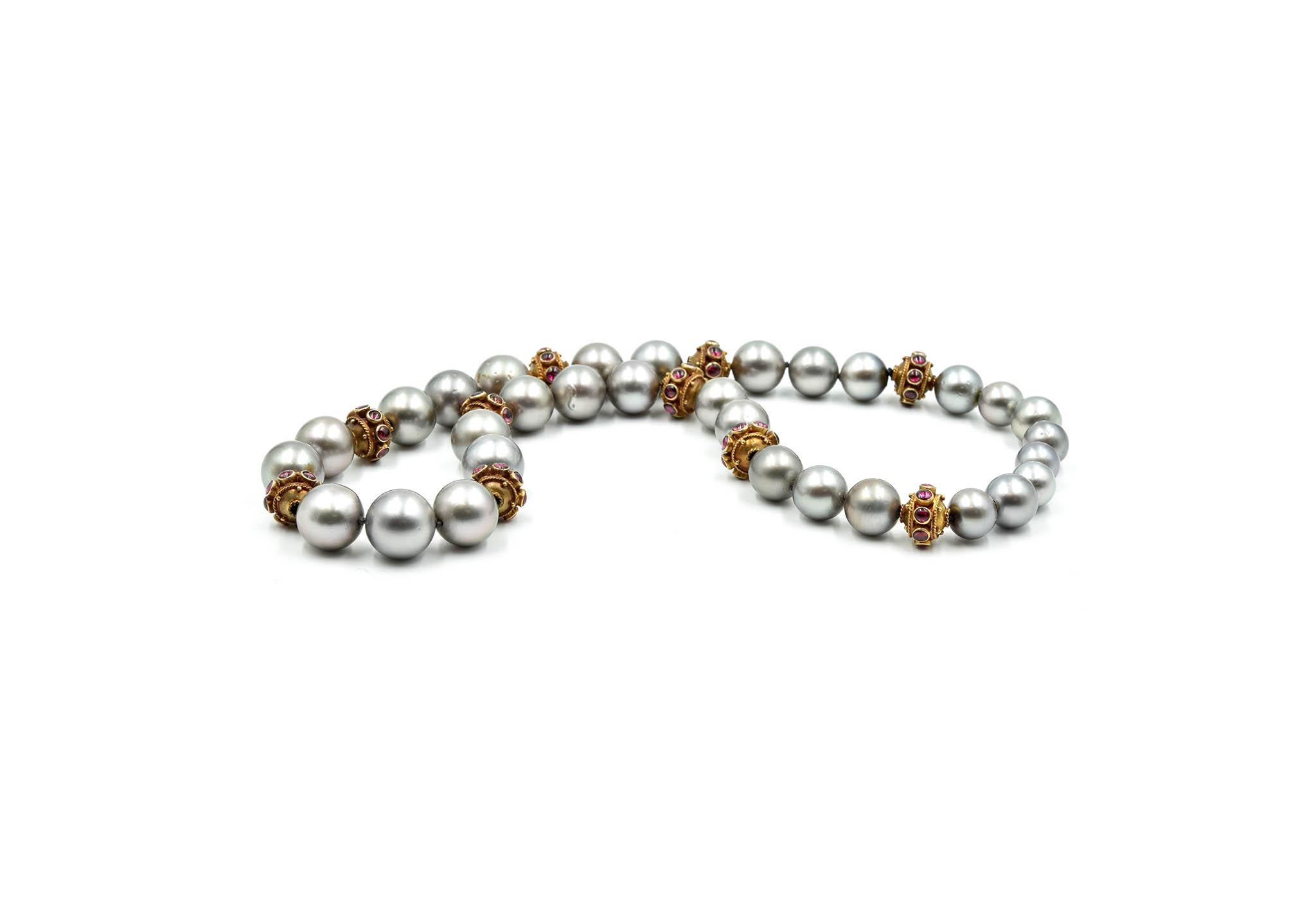 Strand of Black Tahitian South Sea Pearls 14 Karat Yellow Gold Cabochon Rubies In Excellent Condition In Scottsdale, AZ