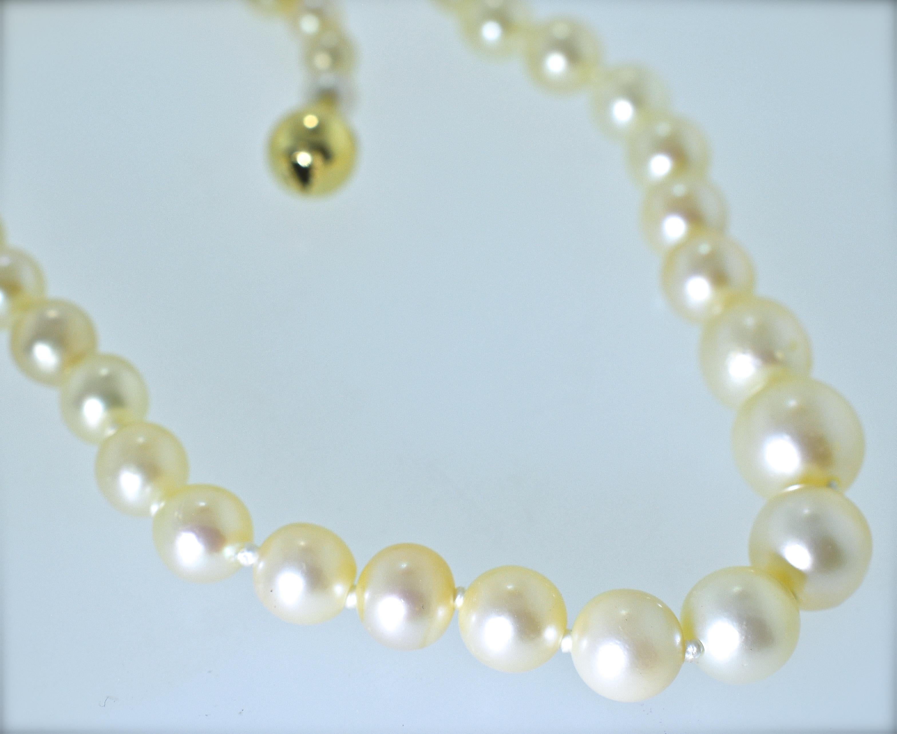 This strand is 16 inches long, finished with a yellow gold clasp.  The 54 matching salt water, round pearls with fine luster, range in size from 5.25 mm. up to 9.37 mm.  These fine  pearls are recently strung and has been knotted between each pearl.