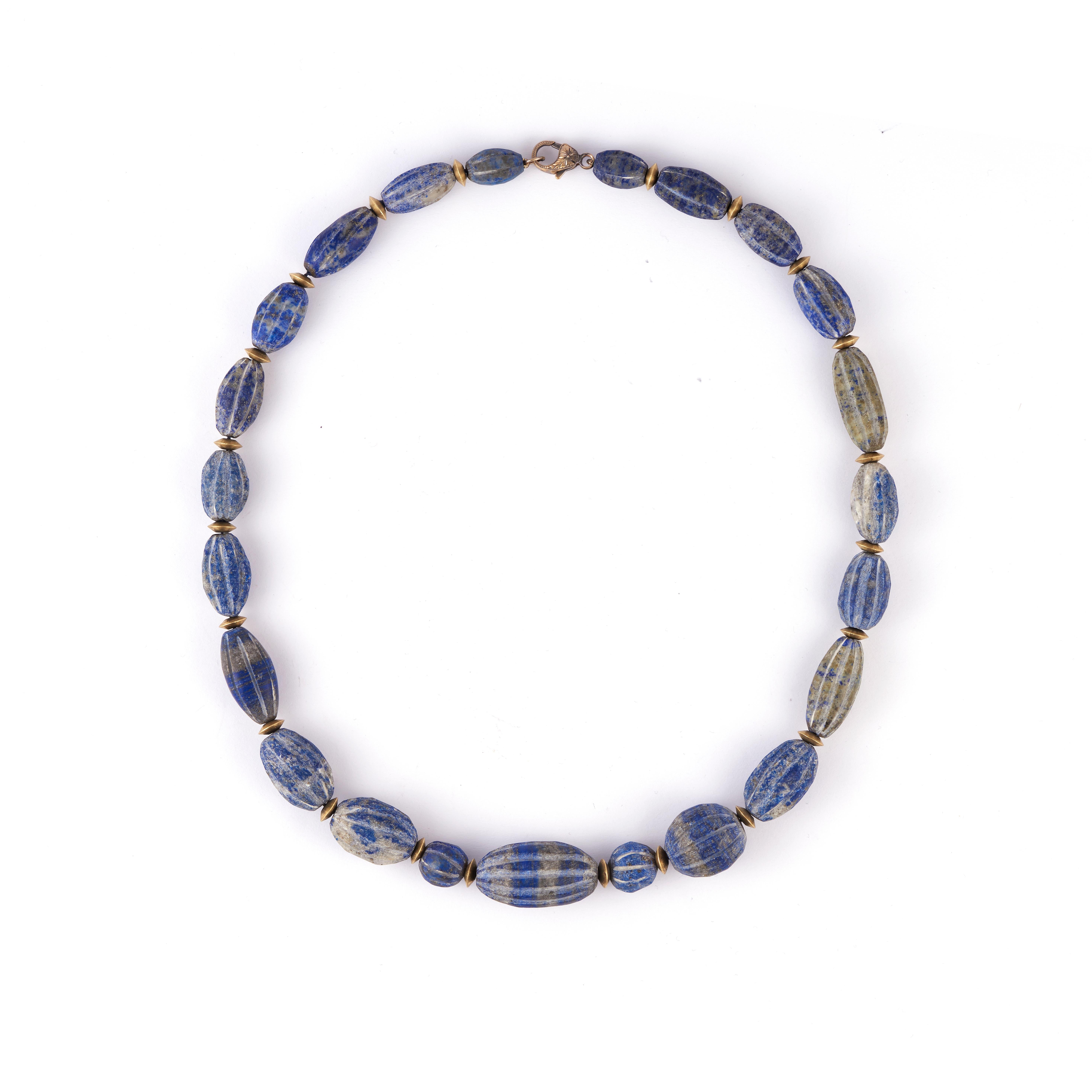 Oblong Lapis Lazuli Beads Circa 1200-1600
18kt Yellow Gold clasp and additional beads
22 inches long

Los Angeles-based jewelry designer Sylva Yepremian has over 20 years of experience crafting custom pieces for clients. Her own line Sylva & Cie is