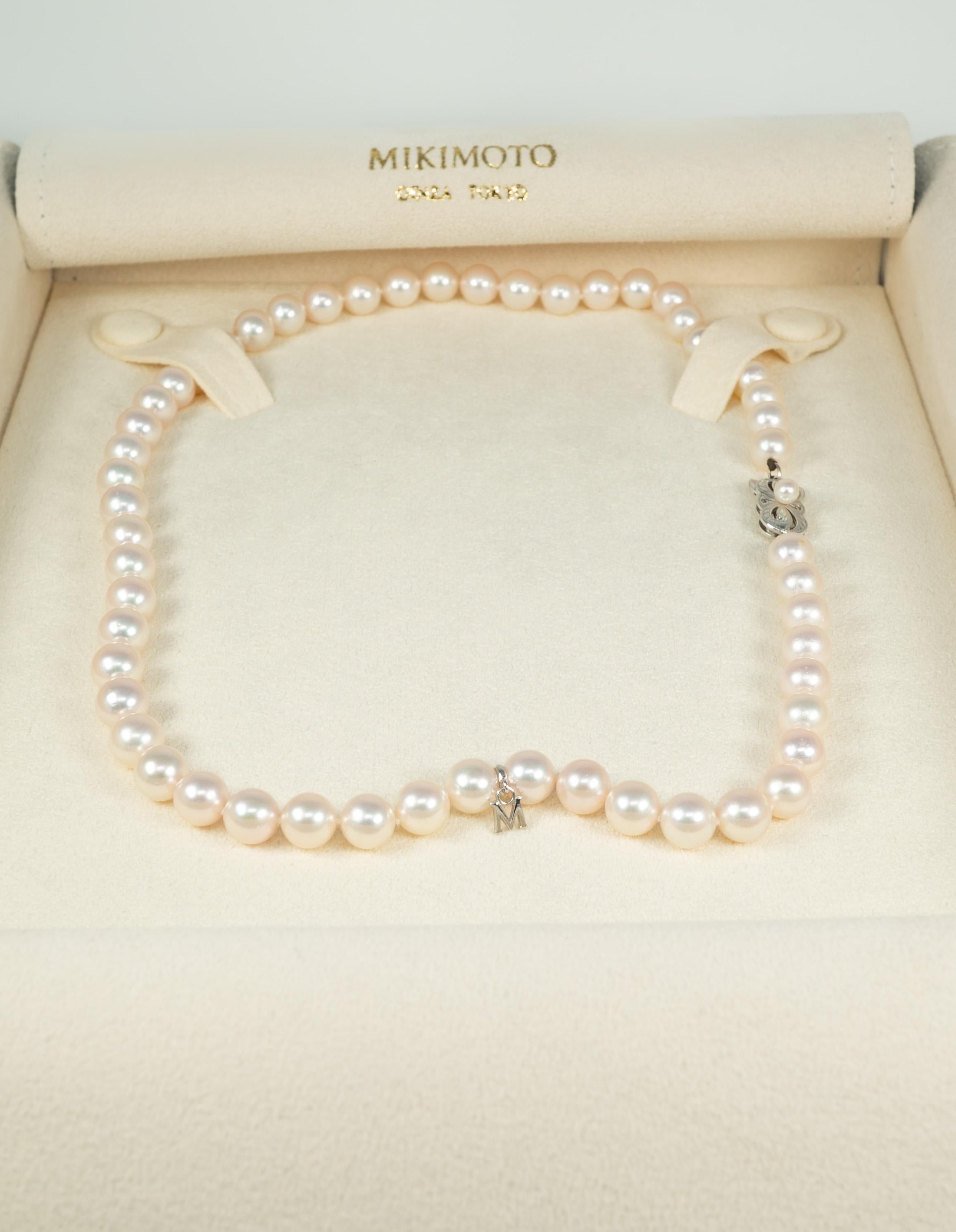 This 18 inch strand of beautifully matched, round cultured pearls is by famous pearl maker Mikimoto.  The pearls measure from 7.50 mm to 7.75 mm, the luster is high and the match is excellent! The fish-hook clasp is in 18 karat yellow gold and the