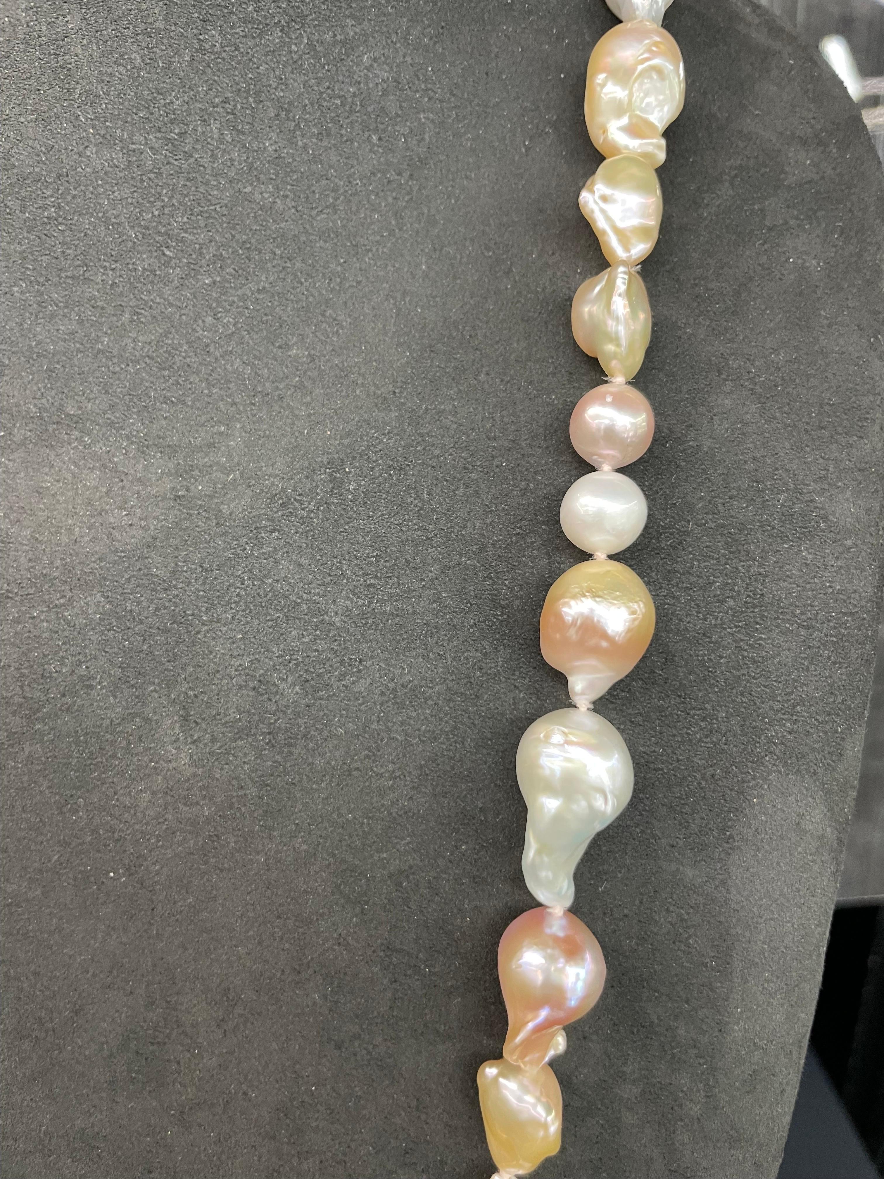 Round Cut Strand of Pink White Baroque Pearls 9-25 MM 42 Inches Long For Sale