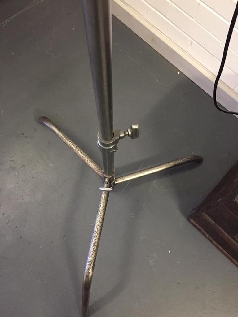 This is an original vintage theatre (spot) light manufactured by Strand Patt 123.
It is very similar to The Strand Patt 23 theatre light. This has been cleaned and restored to take a standard household bulb and is in good working order. The stand is