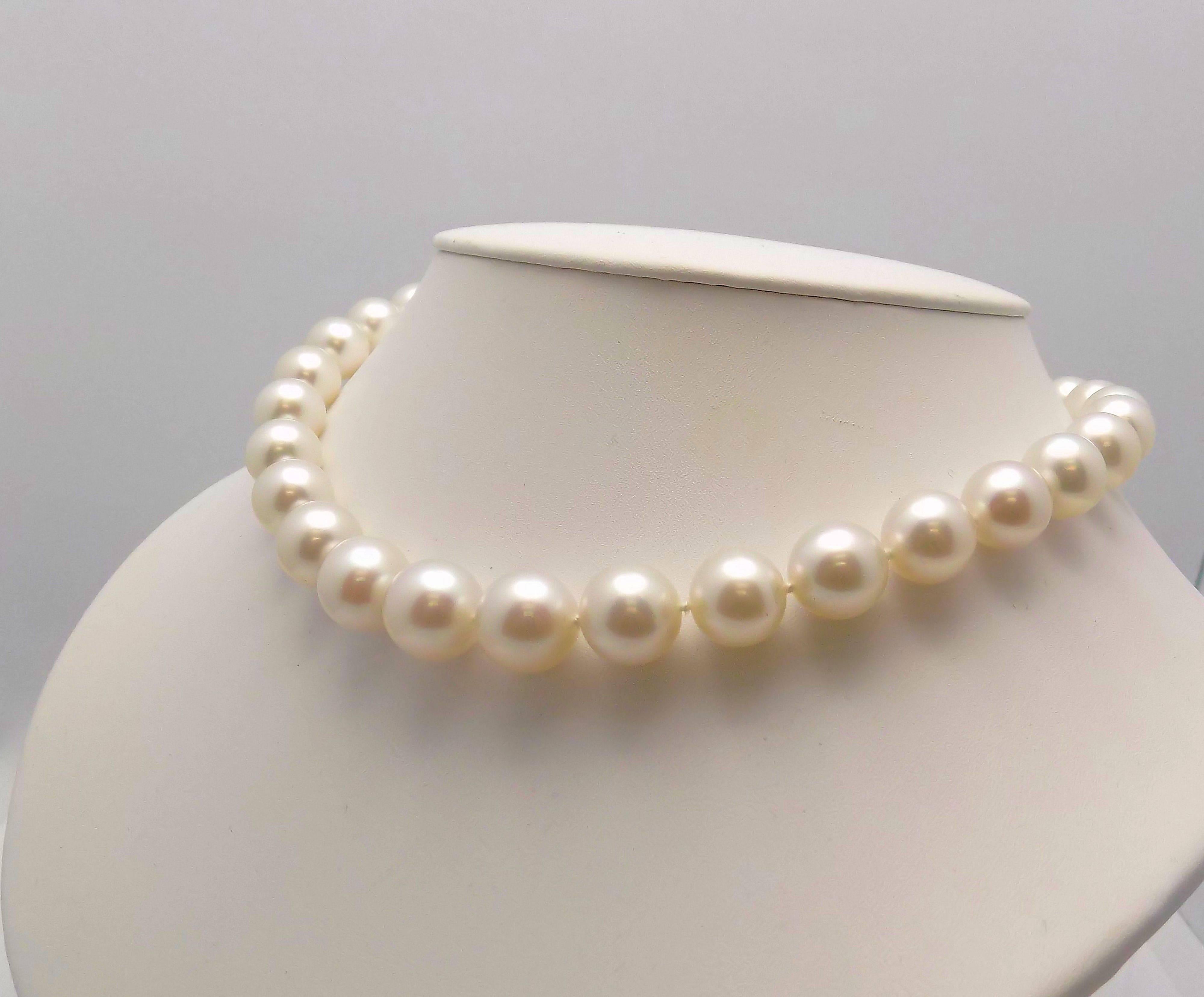 Lustrous Strand of South Sea Cultured Pearls Featuring 33 Round 11-14.2 MM Pearls,  18 Karat White Gold Diamond Pavé Clasp 1.00 Carat Total Weight SI, H, 18