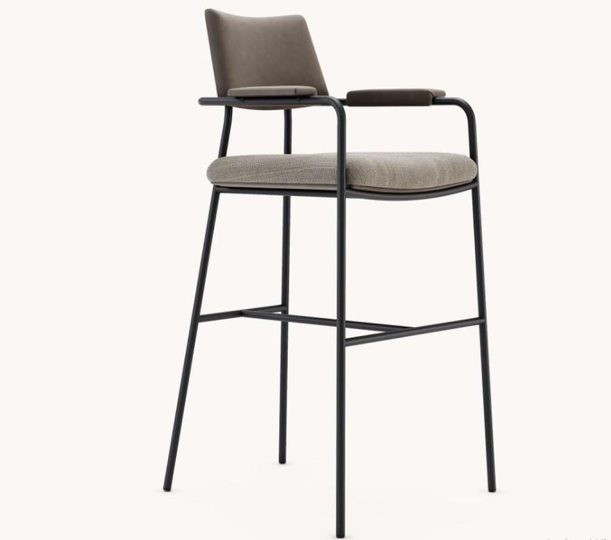 Stranger bar chair by Domkapa
Materials: fiber, black texturized steel. 
Dimensions: W 62 x D 65 x H 120 cm. 
Also available in different materials.

The robust metal structure of Stranger bar and counter chairs gives this design powerful and