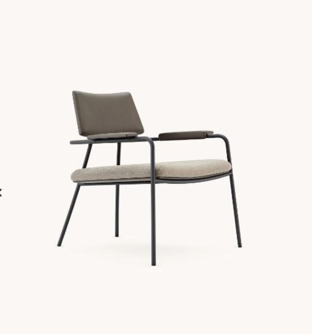 Stranger counter chair by Domkapa
Materials: fiber, black texturized steel. 
Dimensions: W 62 x D 65 x H 105 cm. 
Also available in different materials. 

The robust metal structure of Stranger bar and counter chairs gives this design powerful