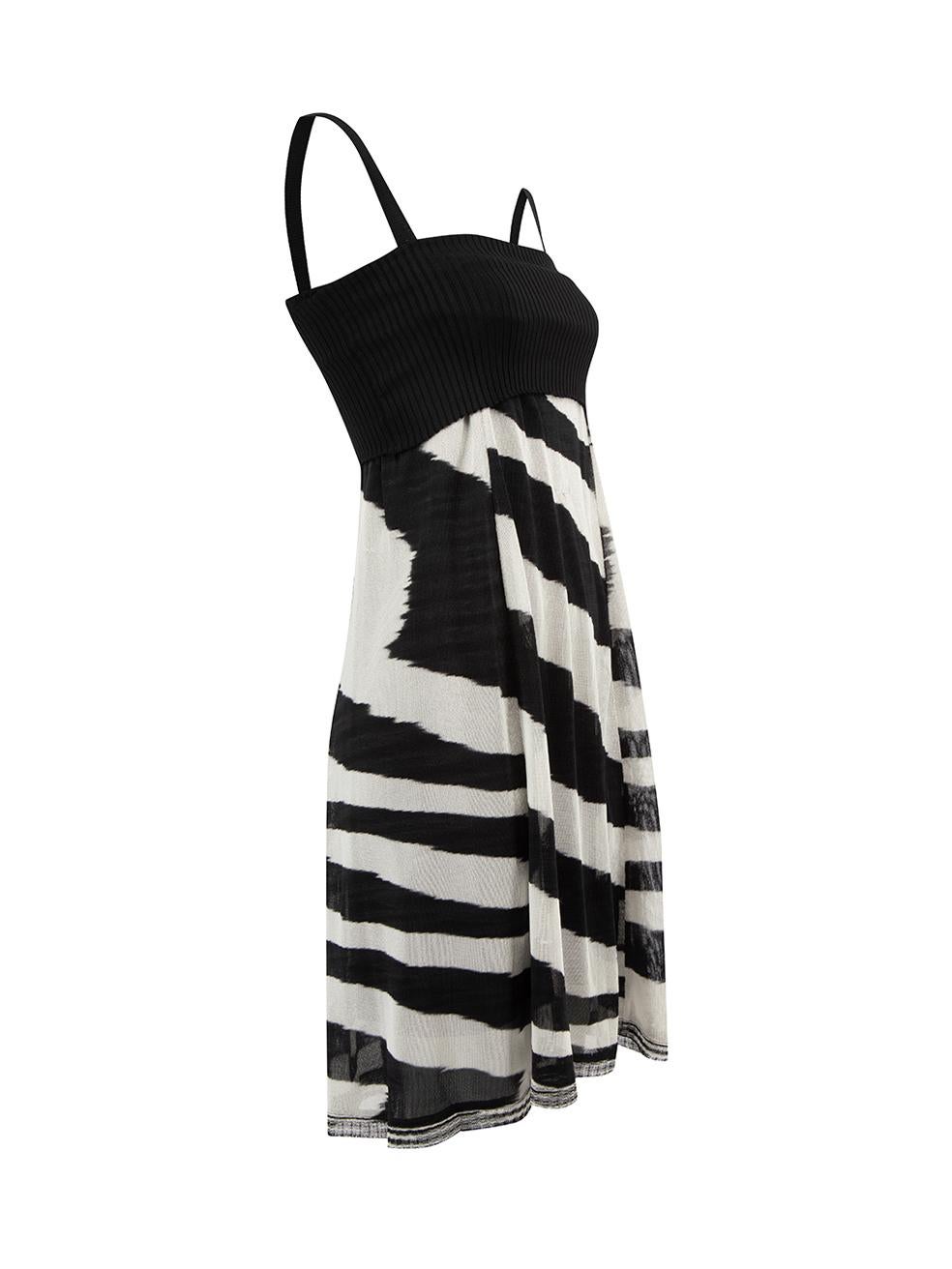 CONDITION is Very good. Hardly any visible wear to dress is evident. Few loose threads seen on this used Missoni designer resale item. 
 
 Details
  Black and white
 Synthetic
 Mini dress
 Knit top
 Zebra print skirt
 
 
 Made in Italy
 
