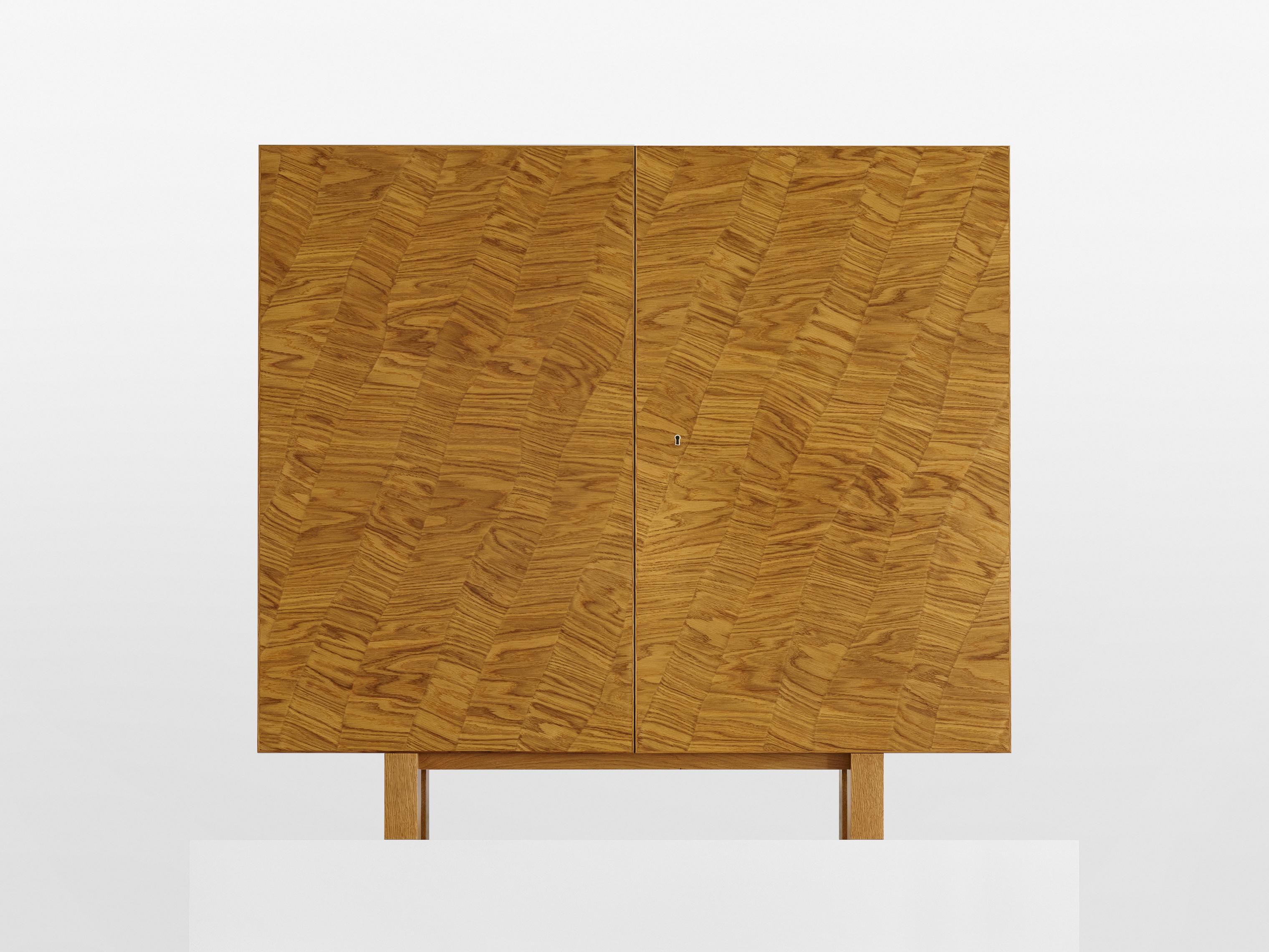 Strata Cabinet by SNICKERIET
Dimensions: D 40 x W 125 x H 115,7 cm. 
Materials: Oak veneer, solid oak, lacquer and wax.

Smaller size adjustments are accepted without additional cost. Larger
adjustments can be discussed as long as the furniture