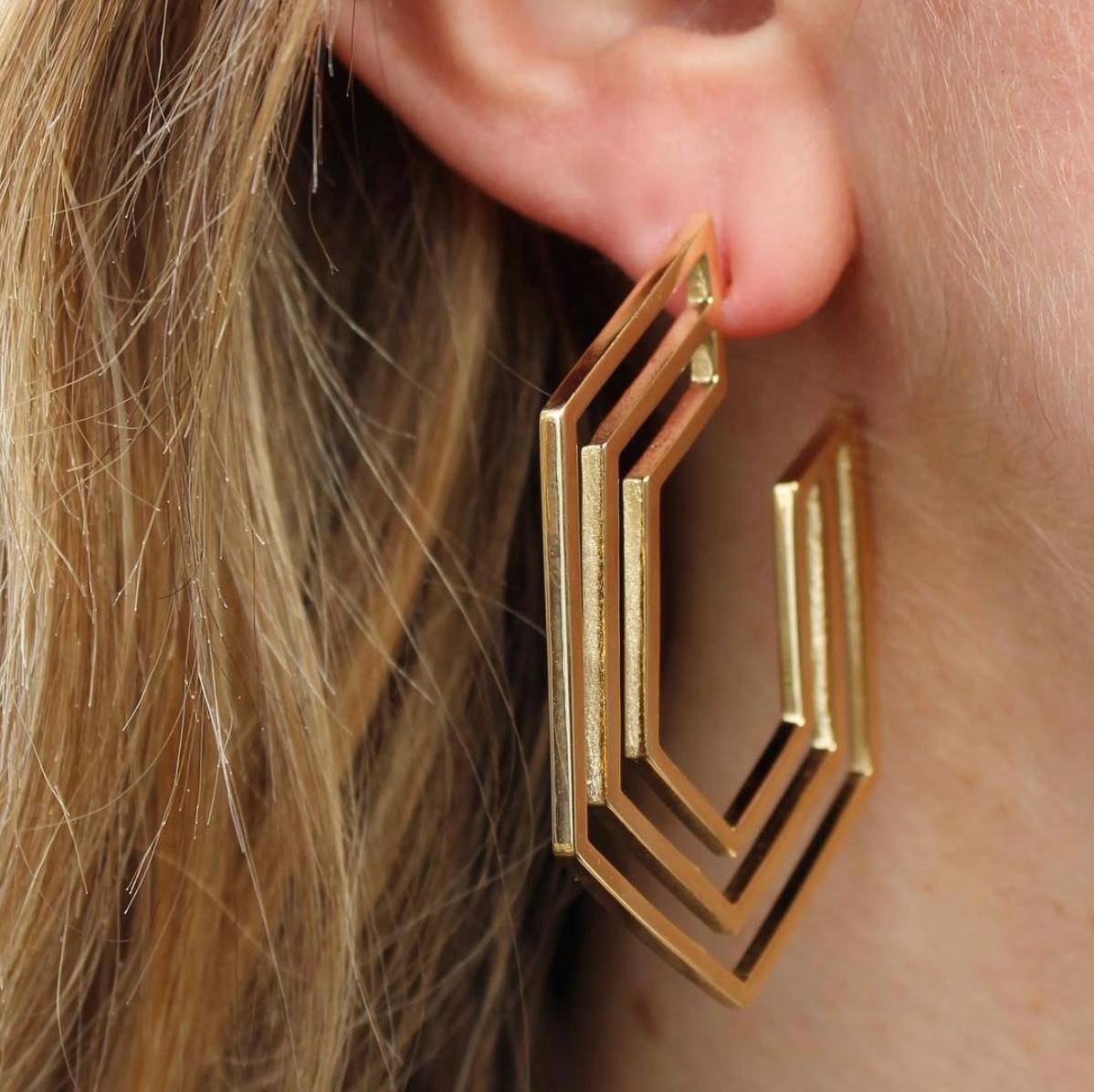 18k Yellow Gold Strata Hoop Earrings feature three rows of solid gold connected to form open hexagon geometric hoops

Includes 18k Yellow Gold push closure earring backings 
From Karma El Khalil's Linea Collection
Available in 18k Yellow, White or