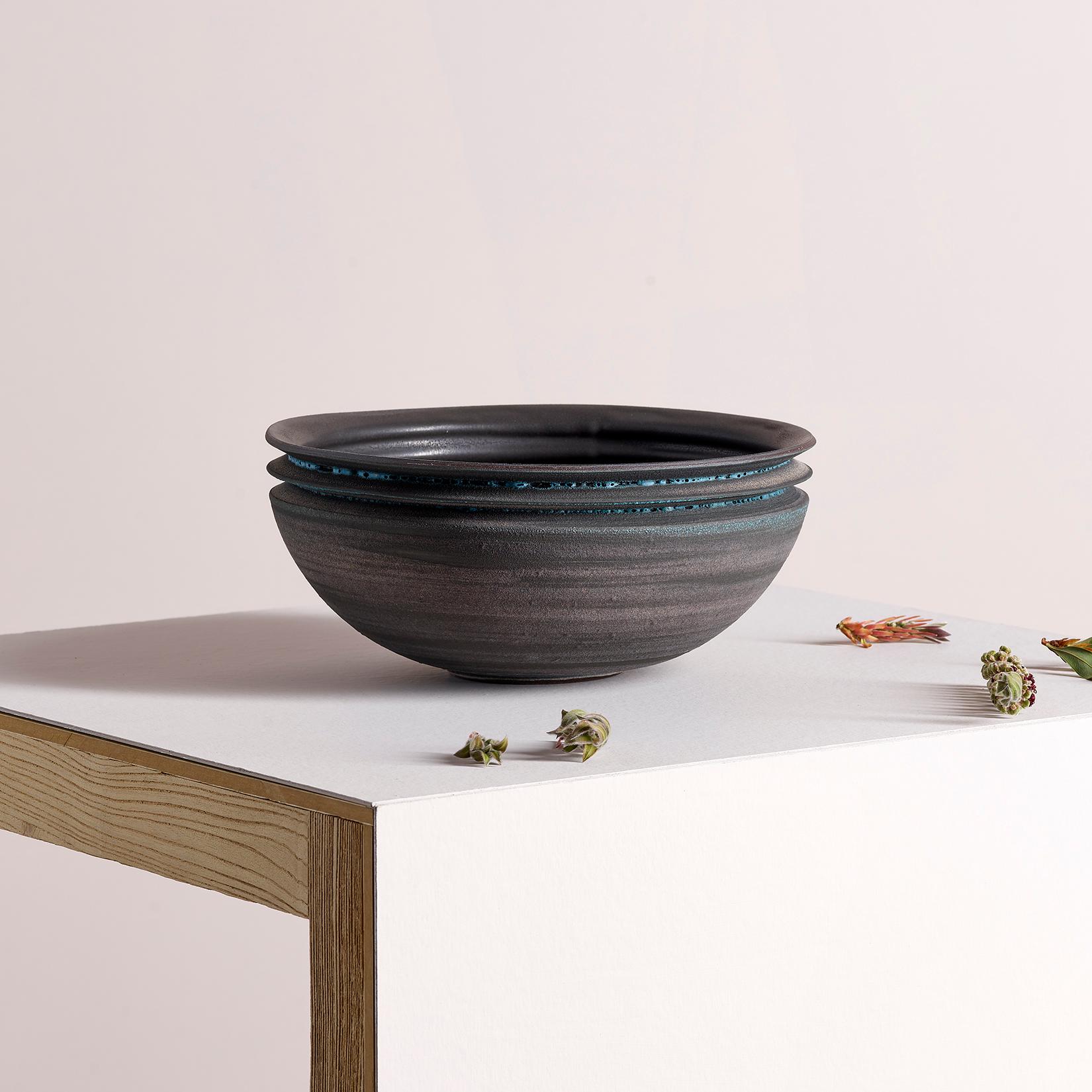 Brave Matter studio’s first accessories collection is characterized by brave silhouettes and evocative material finishes. Uniting ceramic with wood they create utilitarian objects that are equally resolute and ethereal, visceral and