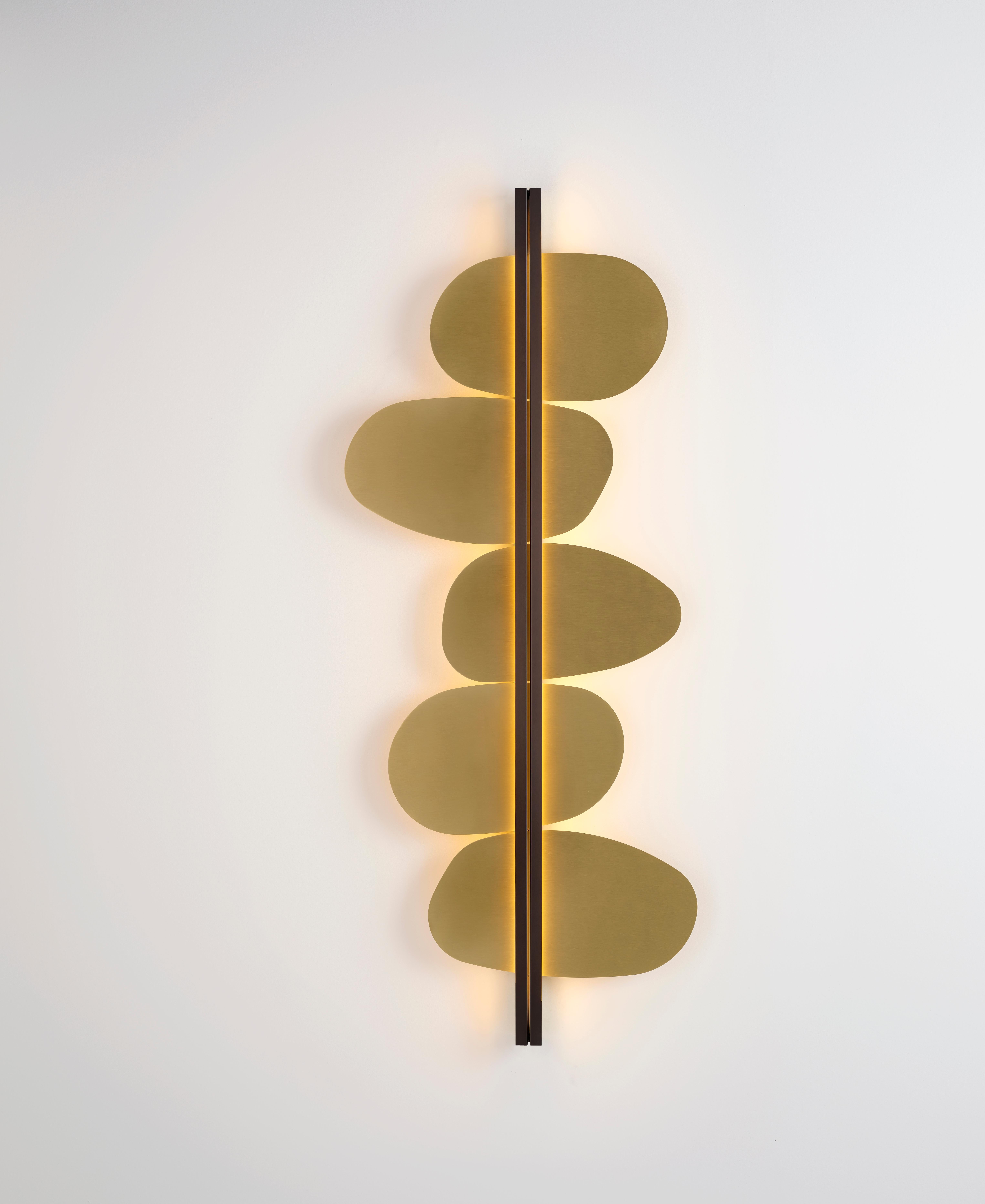 Strate stone wall light by Emilie Cathelineau
Dimensions: W 62.2 x D 8.7 x H 150 cm
Materials: Solid brass, Polycarbonate diffuser.
Others finishes and dimensions are available.

All our lamps can be wired according to each country. If sold to
