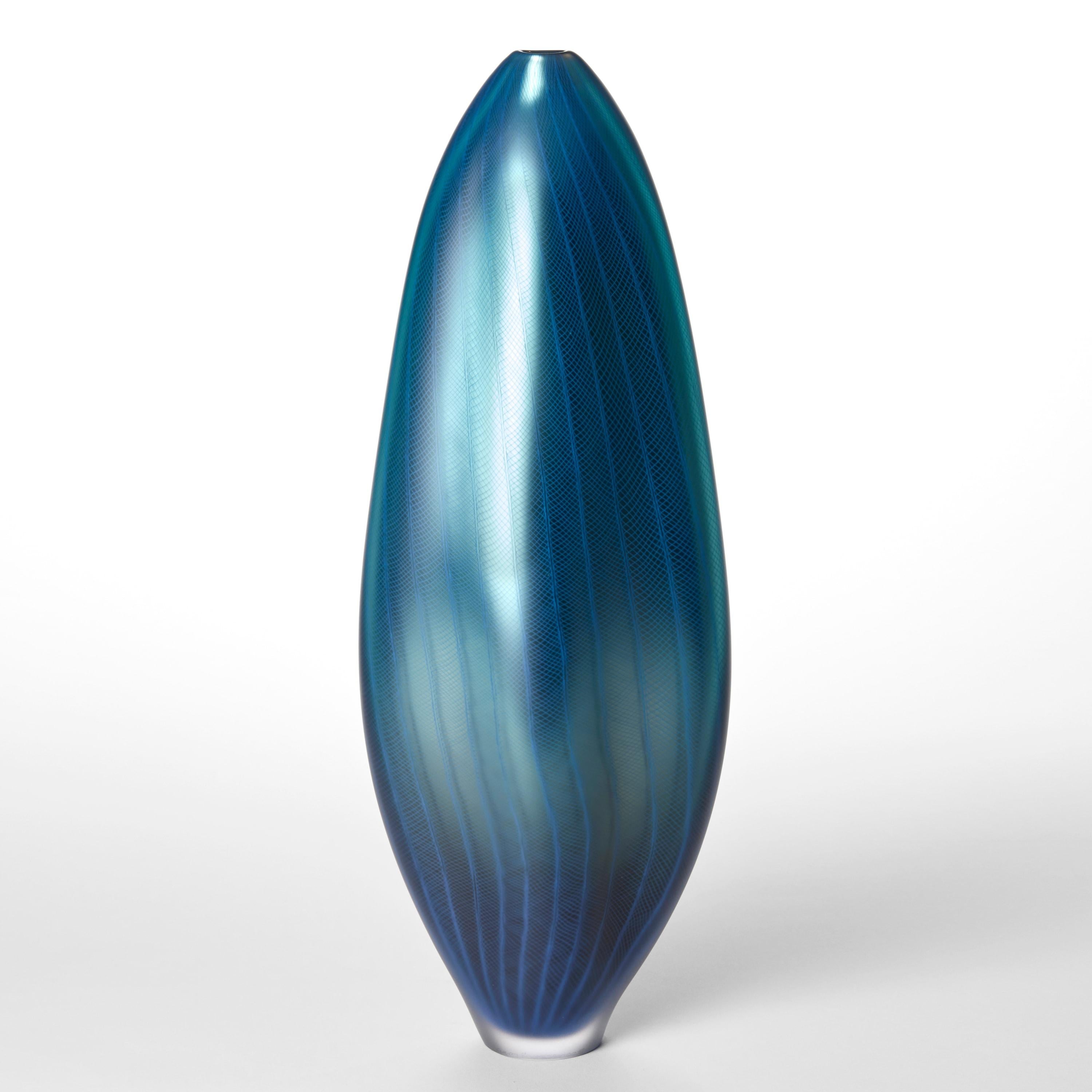 'Stratiform Caerulus 2.0.005' is a unique glass vessel with fine filigree cane detail by the British artist, Liam Reeves. 

Liam Reeves has been making glass professionally since 1998 when he graduated from Middlesex University with a BA (Hons) in