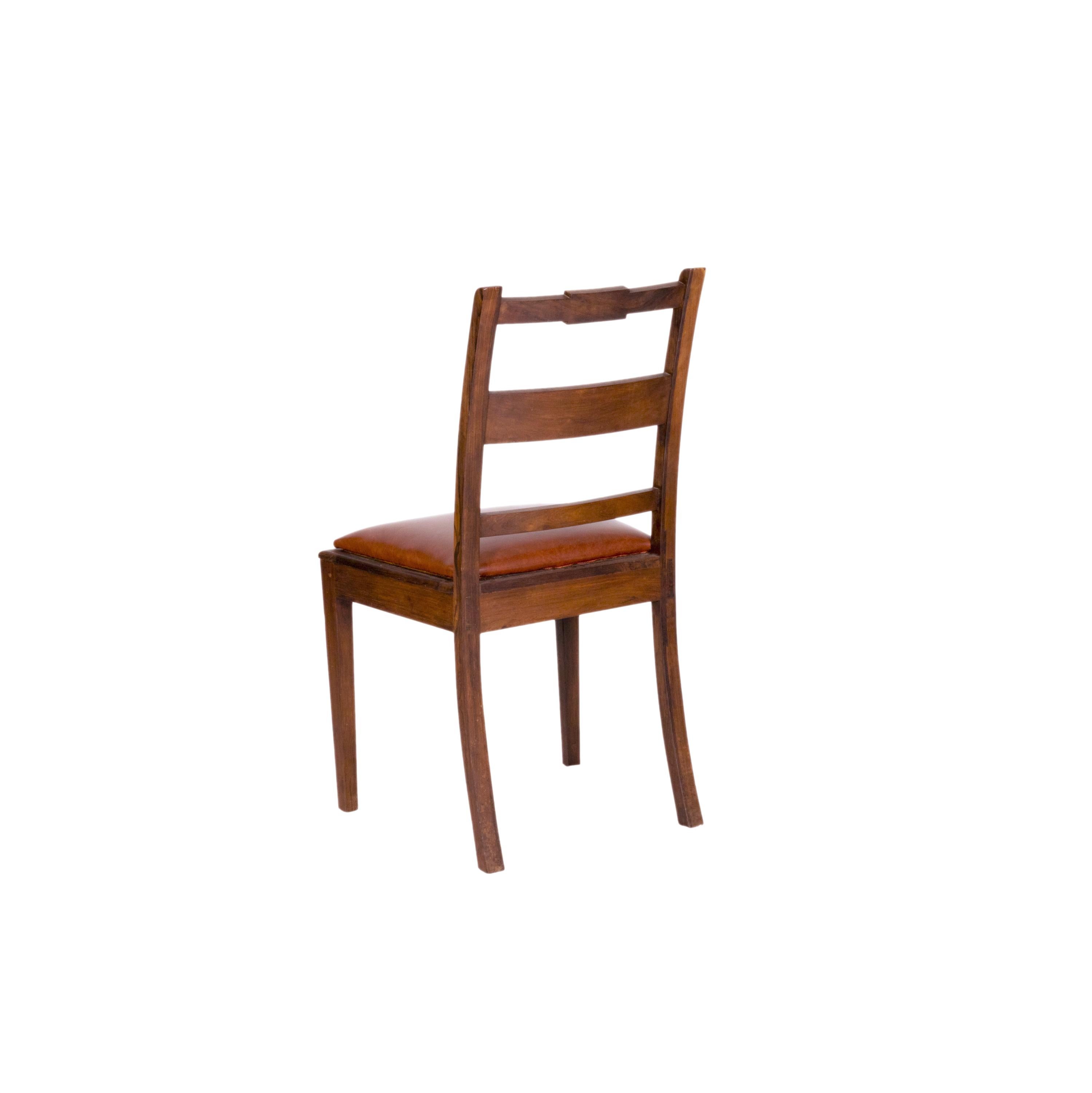 Meticulously maintained solid dining chair with natural straw upholstery and soft leather upper, double layer system, linear marquetry.
Classic Portuguese chair, refinished by a carpenter, in great condition.

Dimensions: 
Height: 34.85 in (88.5
