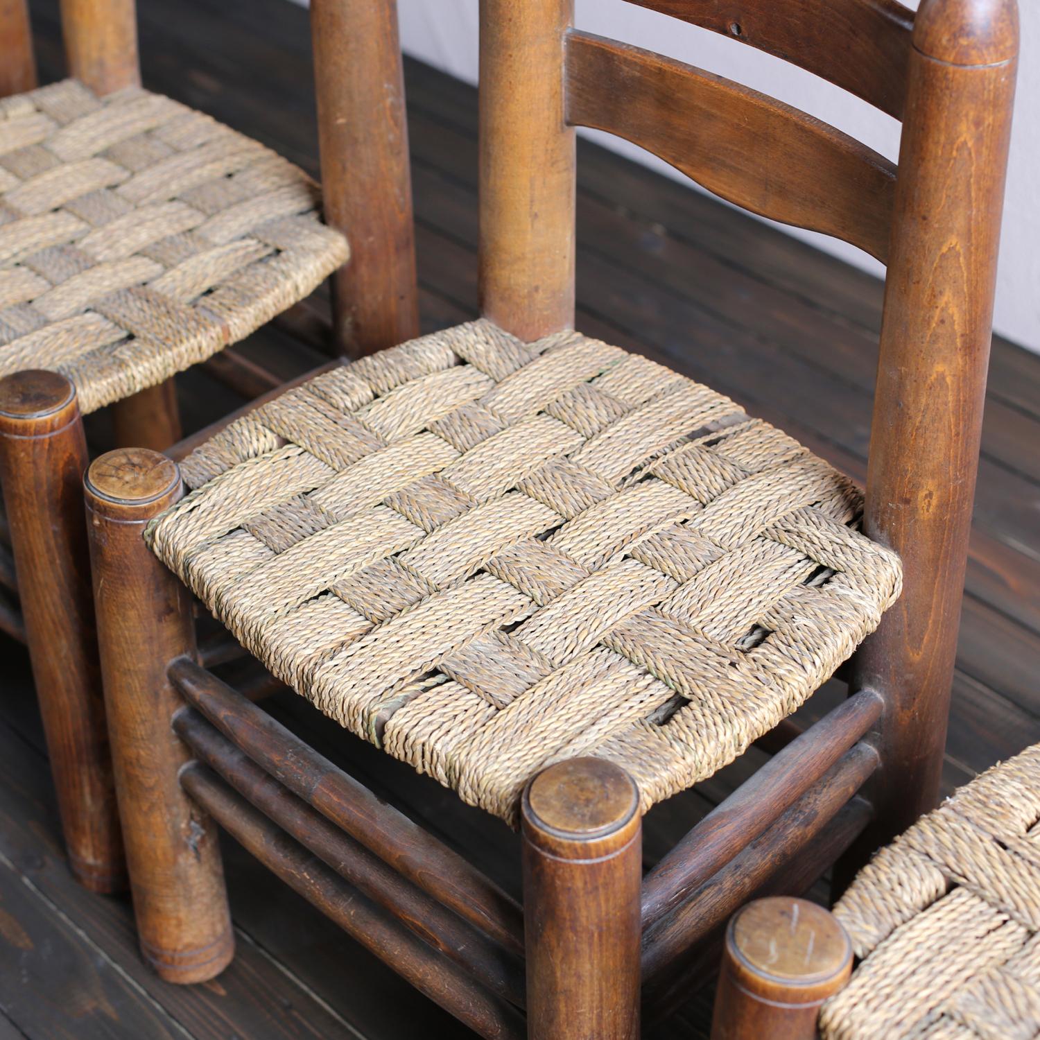 Set of 6 straw chairs by Charles Dudouyt. Structure in massive oak with straw as a seat.