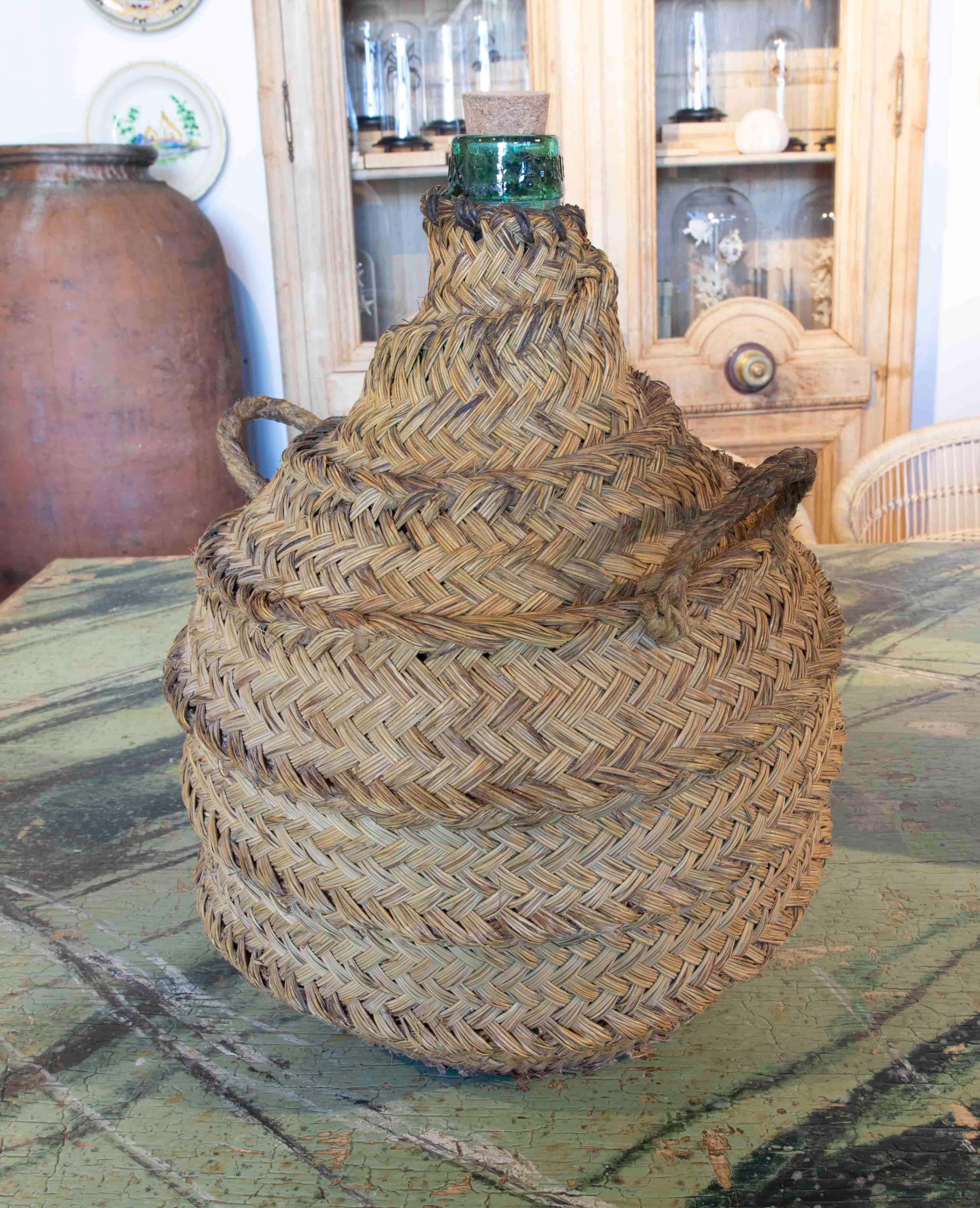 Straw-Covered Glass Bottle Wine Holder In Good Condition In Marbella, ES