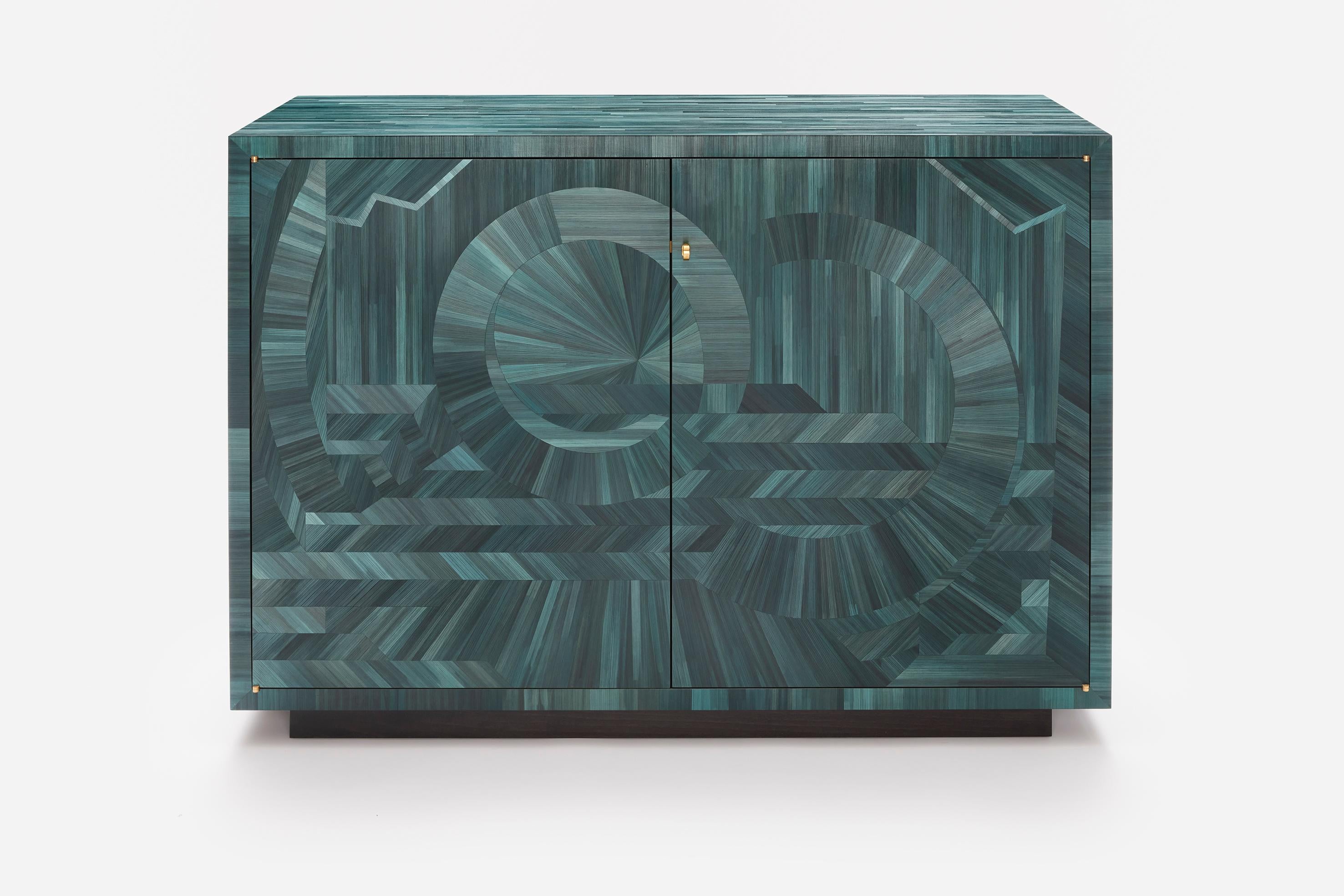 Abruzzo green straw Marquetry cabinet by Simon Orrell Design
 Measures: Width 120cm Depth 45cm Height 83cm
Dimension can be customized according to specific needs. 
Finish: Straw Marquetry - Interiors in dark American Walnut with single