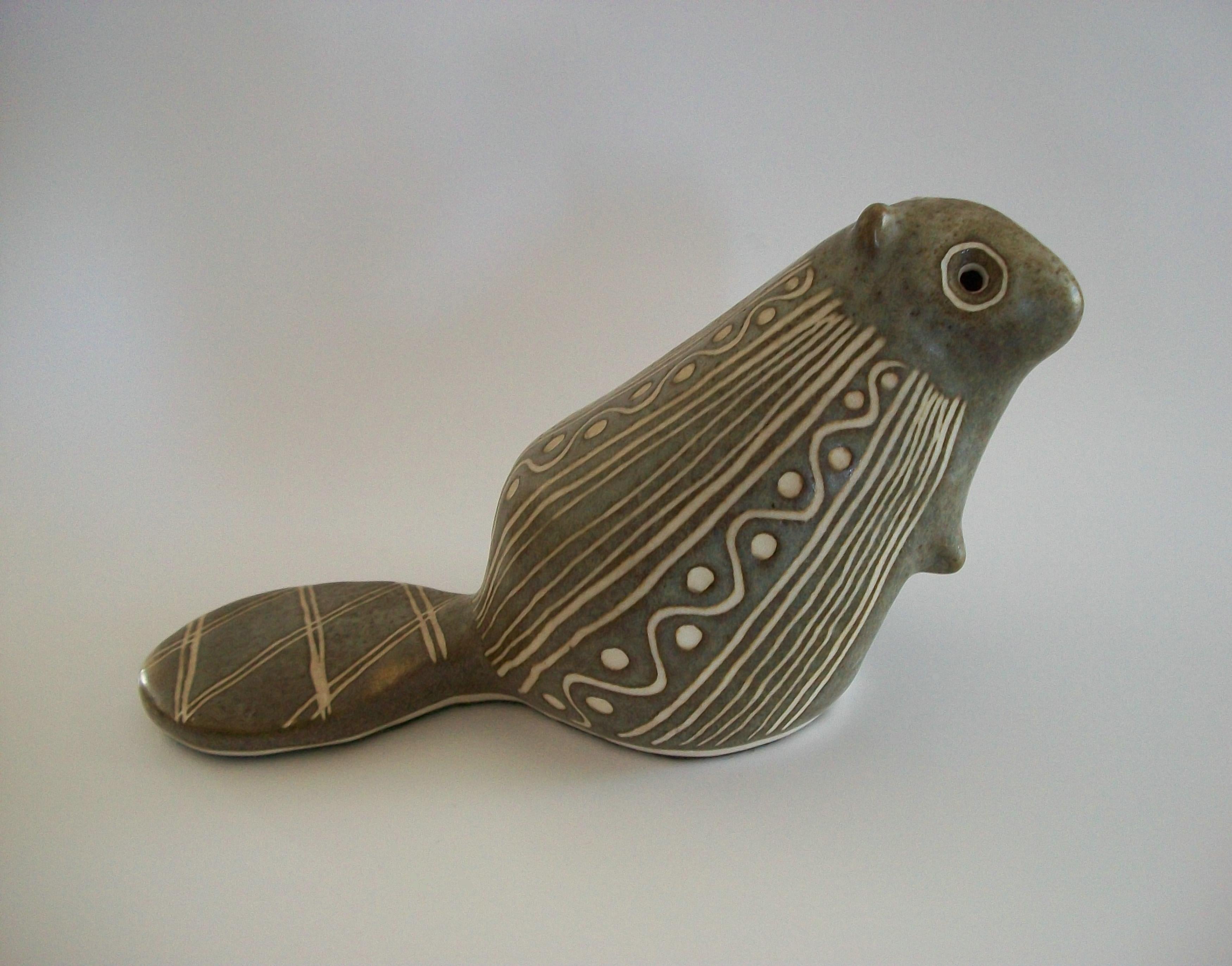 STRAWBERRY HILL WERKSHOP POTTERY (Peter & Liz Powlowski - Studio Active 1970 to early 1990's) - Fine Scandinavian style studio pottery ironstone model of a beaver - large size - mold made - featuring elaborate hand crafted abstract sgraffito design