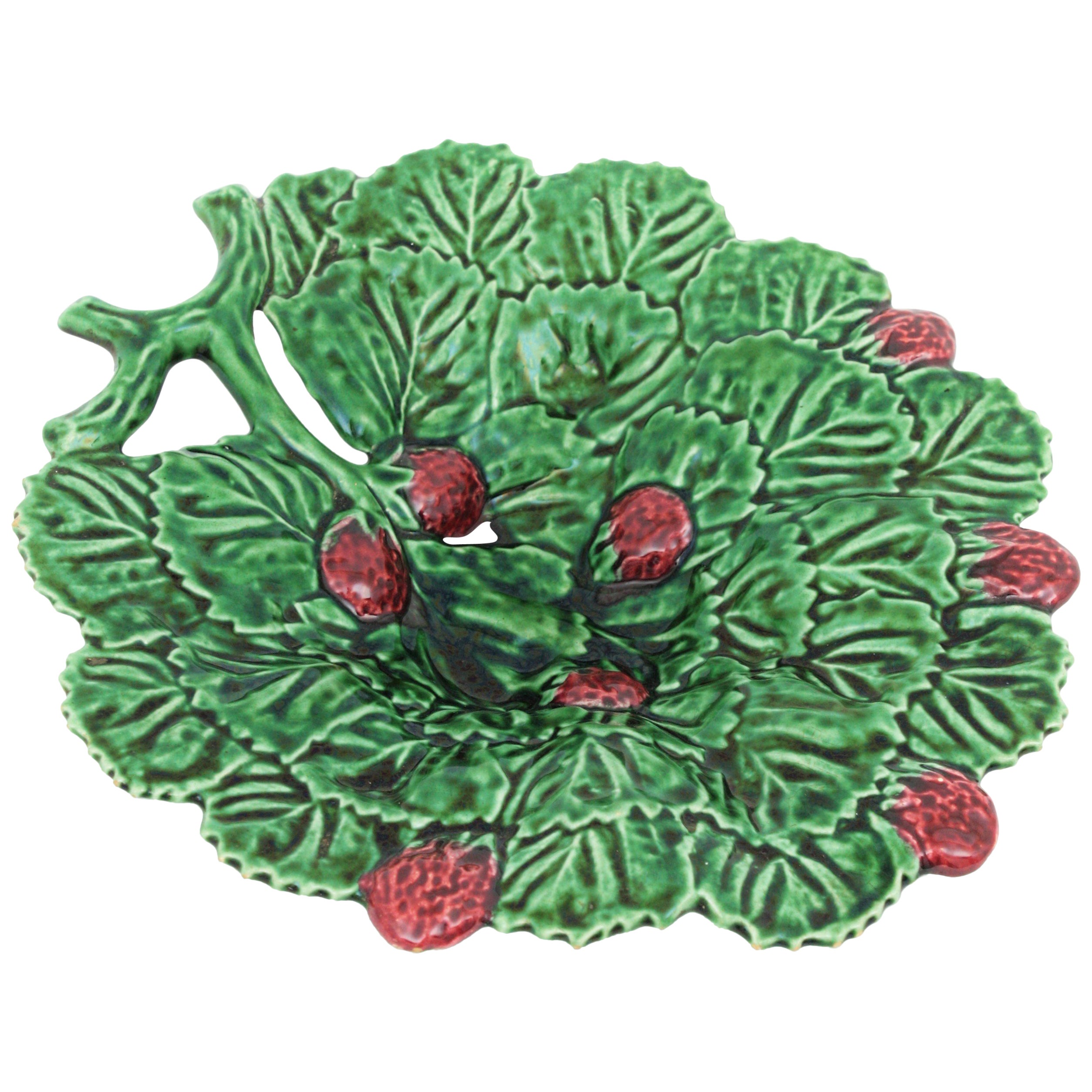 Modernist strawberries leaf design glazed ceramic platter, Portugal, 1950s
A beautiful hand painted Majolica ceramic leaf with strawberries large platter or centerpiece.
A piece lovely to use as vide-poche, centerpiece of fruit platter of sweets