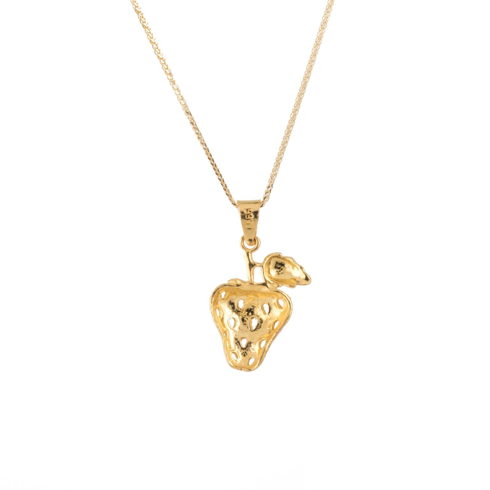 Charming strawberry pendant & necklace, crafted in 24 karat yellow gold (pendant) and 14 karat yellow gold (chain).  

The pendant comes with a fine link 14k yellow chain that measures 16 inches in length.

The pendant & necklace is in very good