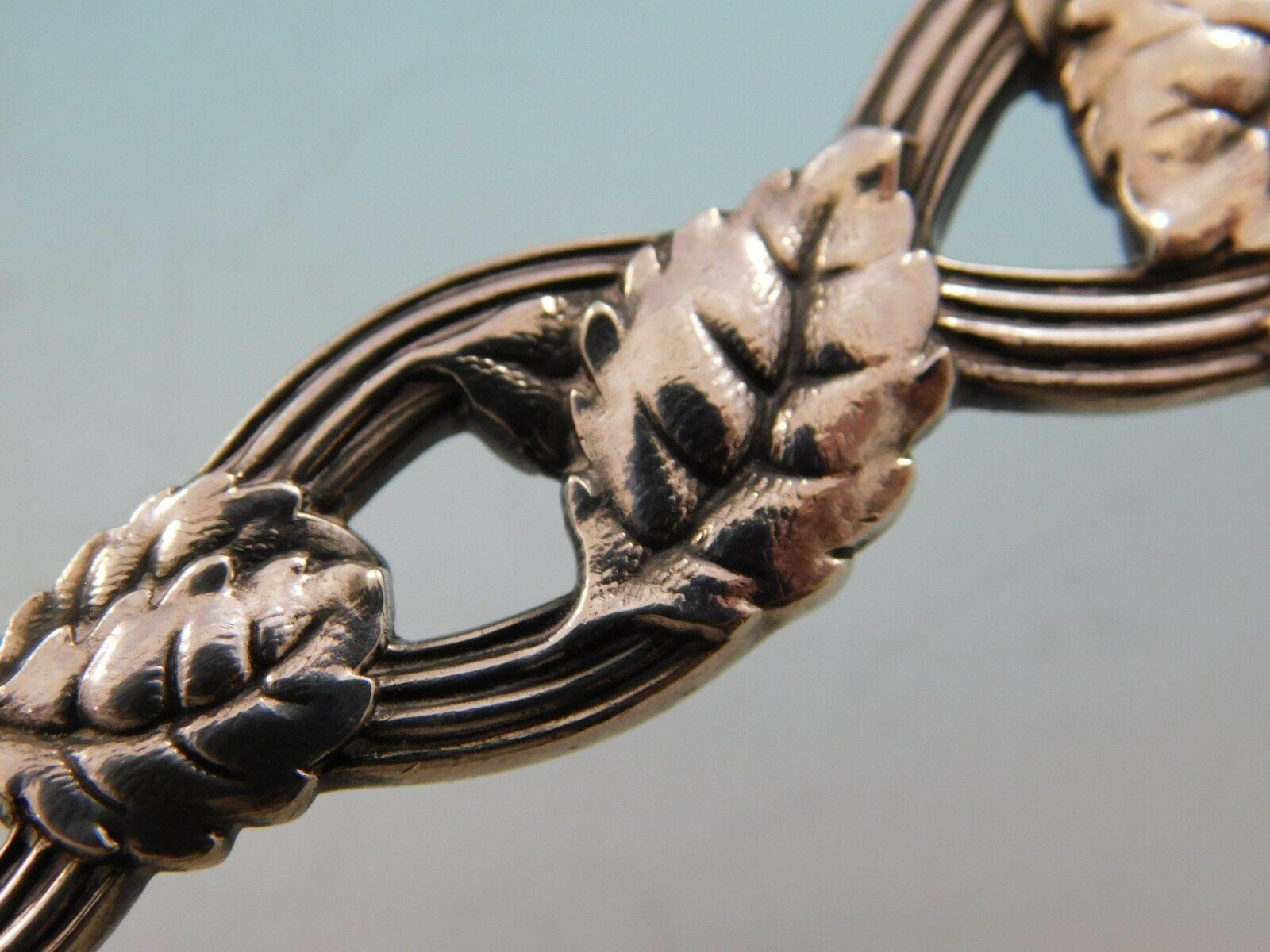 Strawberry Vine de Tiffany & Co. Cuillère à baies en argent sterling en forme de coquille de conque 1