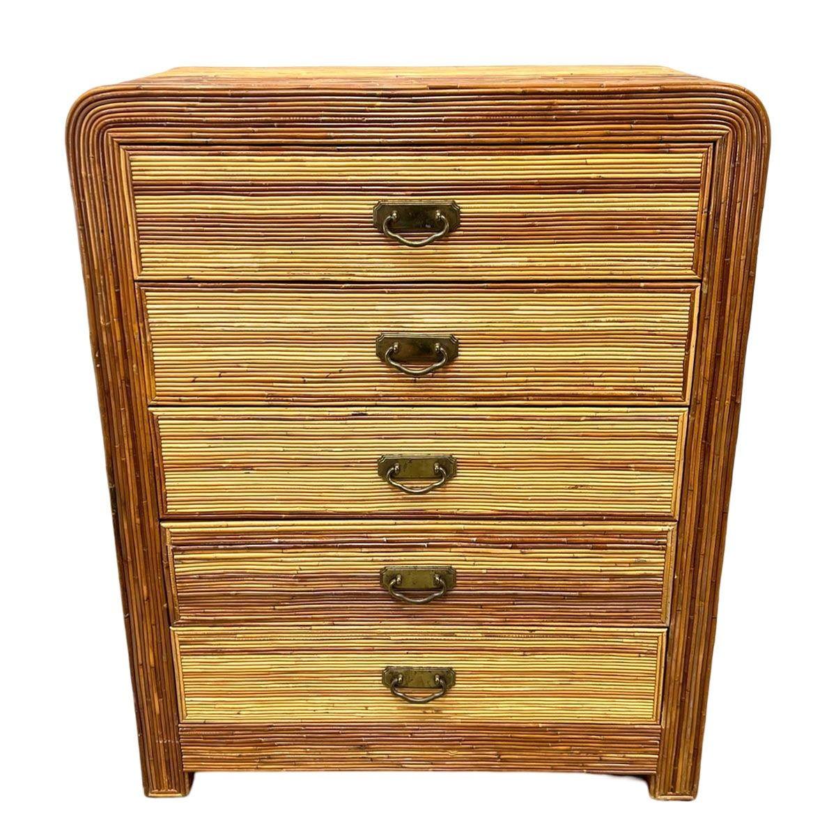 Streamline Art Deco pencil reed chest of drawers/highboy dresser combines rounded speed lines and waterfall corners, echoing the organic modernism later found by designers like Gabriella Crespi. The piece features a geometric modernist shape that