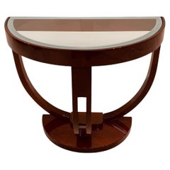 Tavolino Streamline con piano in vetro a forma di mezzo cerchio Art Deco americano C.I.C. 1930