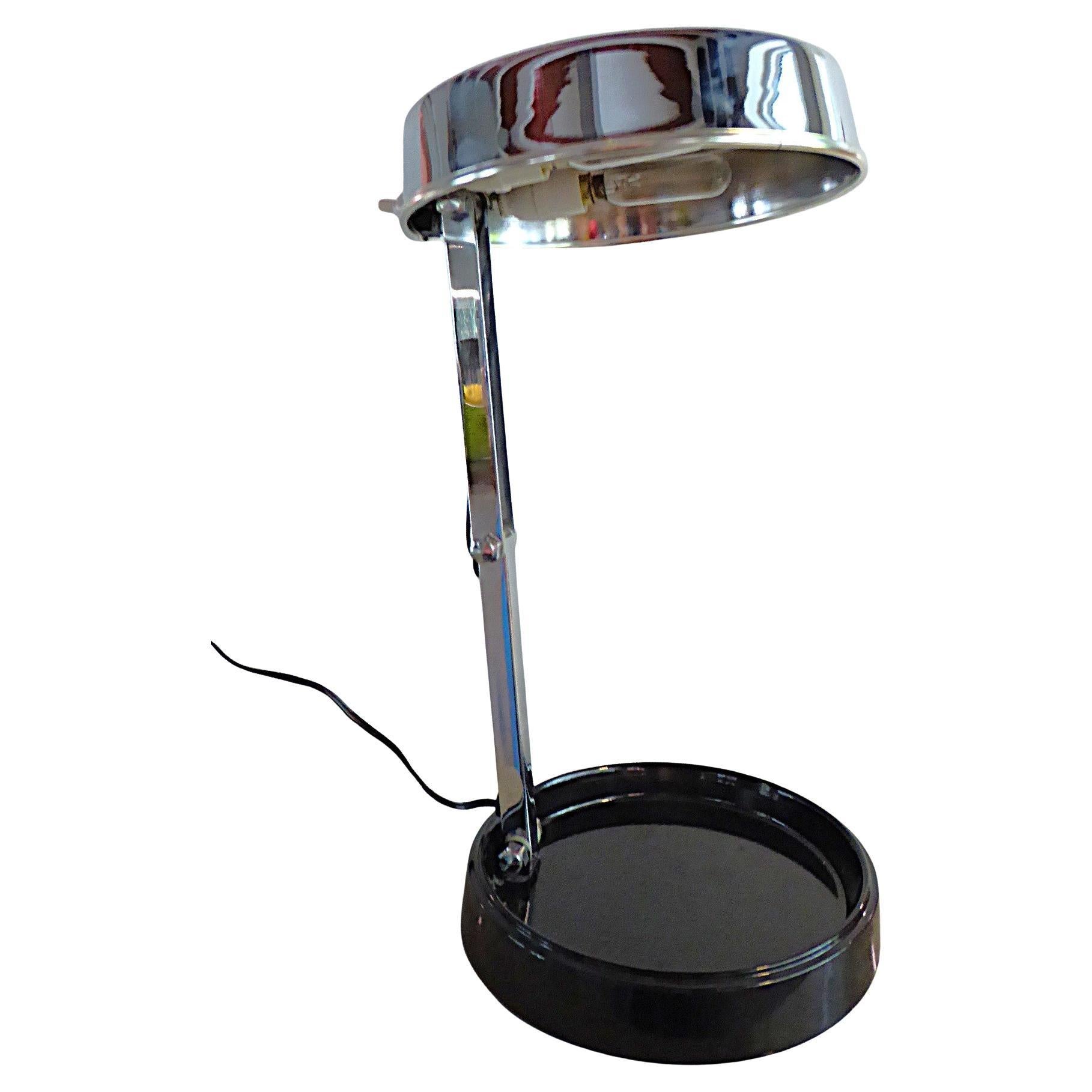 Minimalist Modern Spanish Folding Desk Lamp by Enrique Aparicio for Gabinete de Estudios Industriales from 1961.  With its low profile, when closed, this metal lamp is the perfect desk lamp. Its heavy black enameled base ensures that the lamp won't