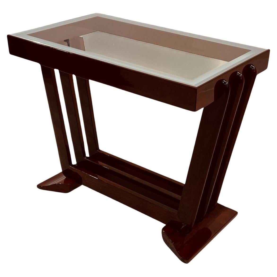Streamline Moderne Art Deco side table in solid walnut.  A classic American Art deco design. Reminiscent of the designs and works of Donald Deskey and Gilbert Rohde. Hand crafted and professional restoration with a beautifully sandblasted frosted