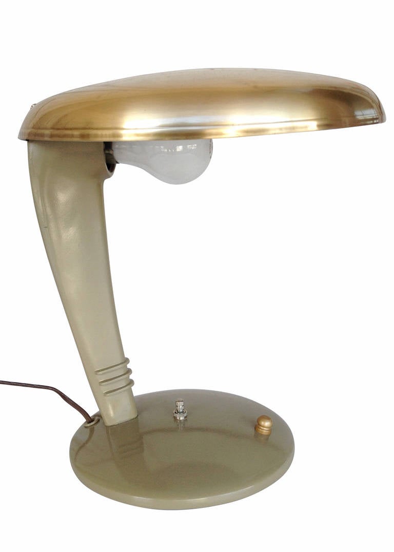 This streamlined modern table lamp, known as 