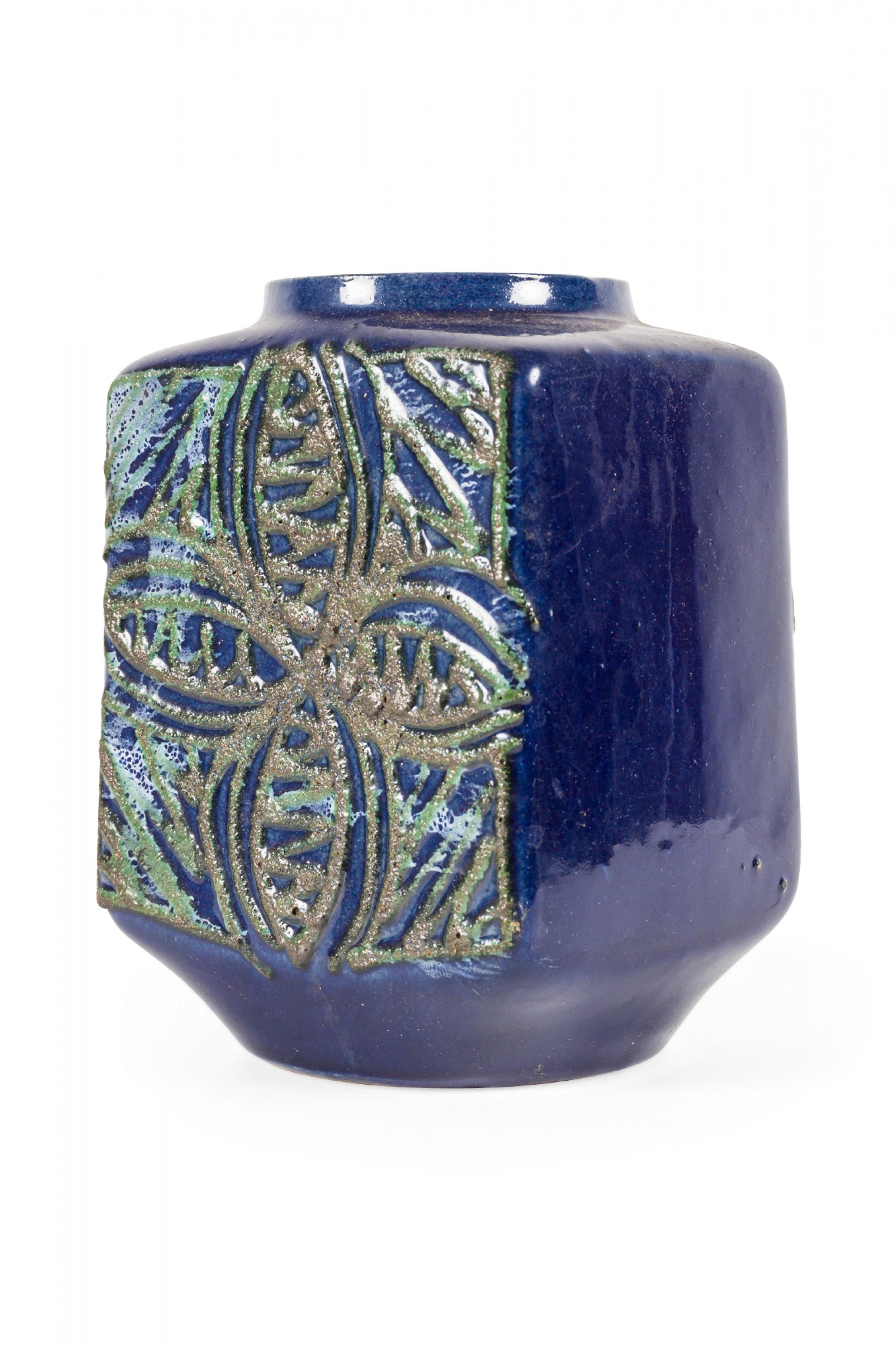 East German mid-century square ceramic vase with a raised gold and green clover and line pattern against a deep blue glazed ground. (stamped on bottom, STREHLA MADE IN GDR 7277).
