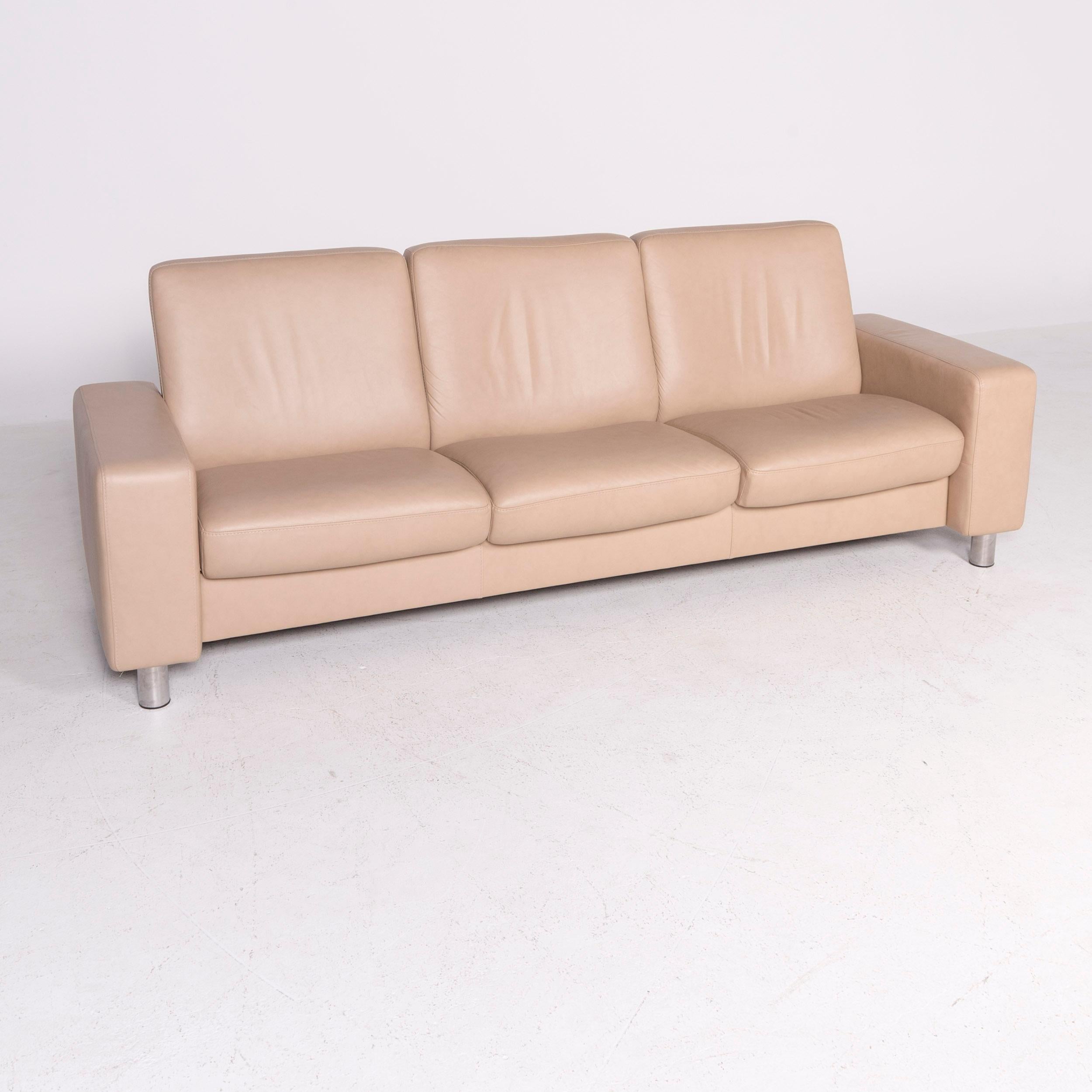 We bring to you a Stressless designer leather sofa beige genuine leather three-seat couch.

Product measurements in centimeters:

Depth 78
Width 233
Height 84
Seat-height 42
Rest-height 55
Seat-depth 42
Seat-width 191
Back-height 47.
  