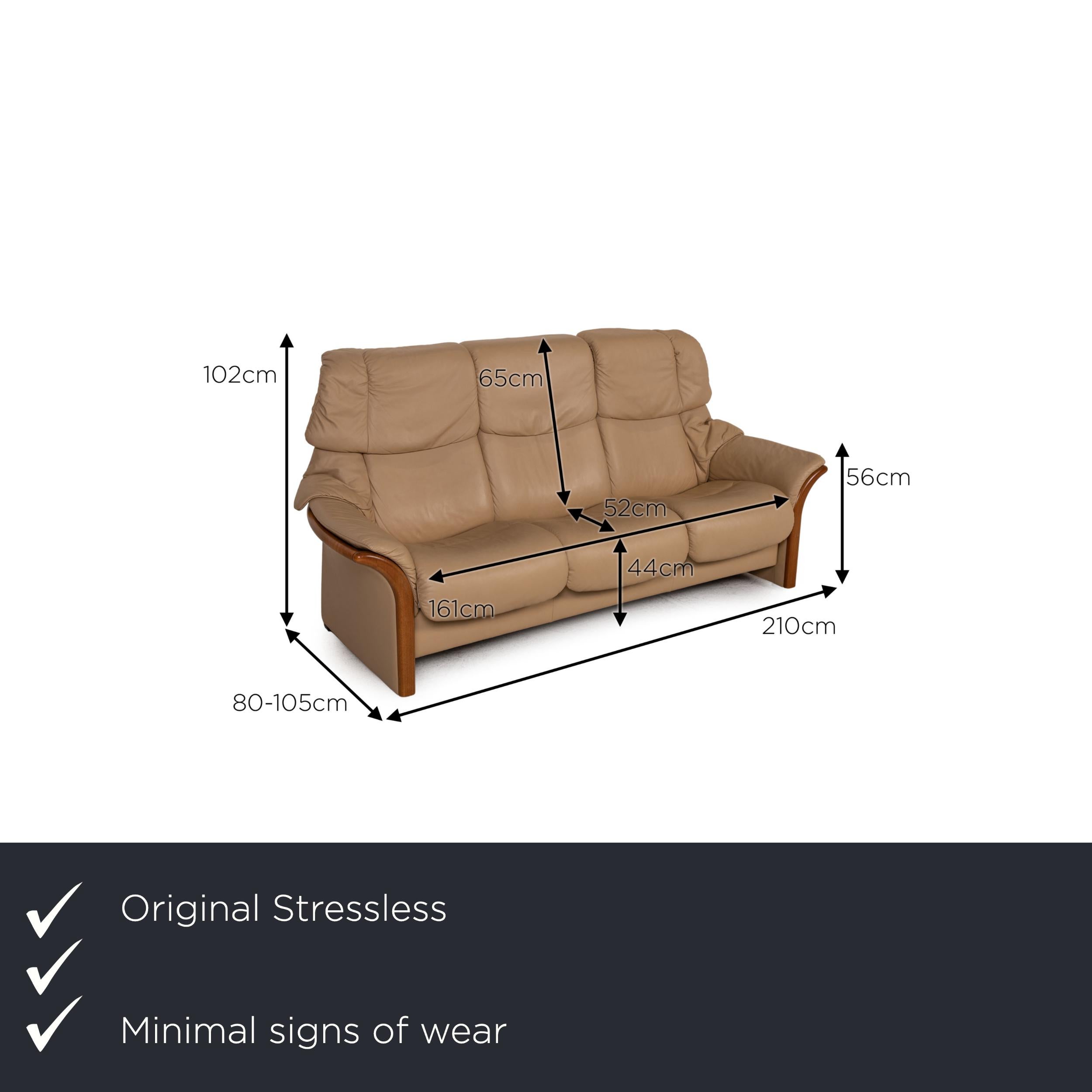 We present to you a Stressless Eldorado leather sofa beige three seater couch.

Product measurements in centimeters:

depth: 80
width: 210
height: 102
seat height: 44
rest height: 56
seat depth: 52
seat width: 161
back height: 65.

 