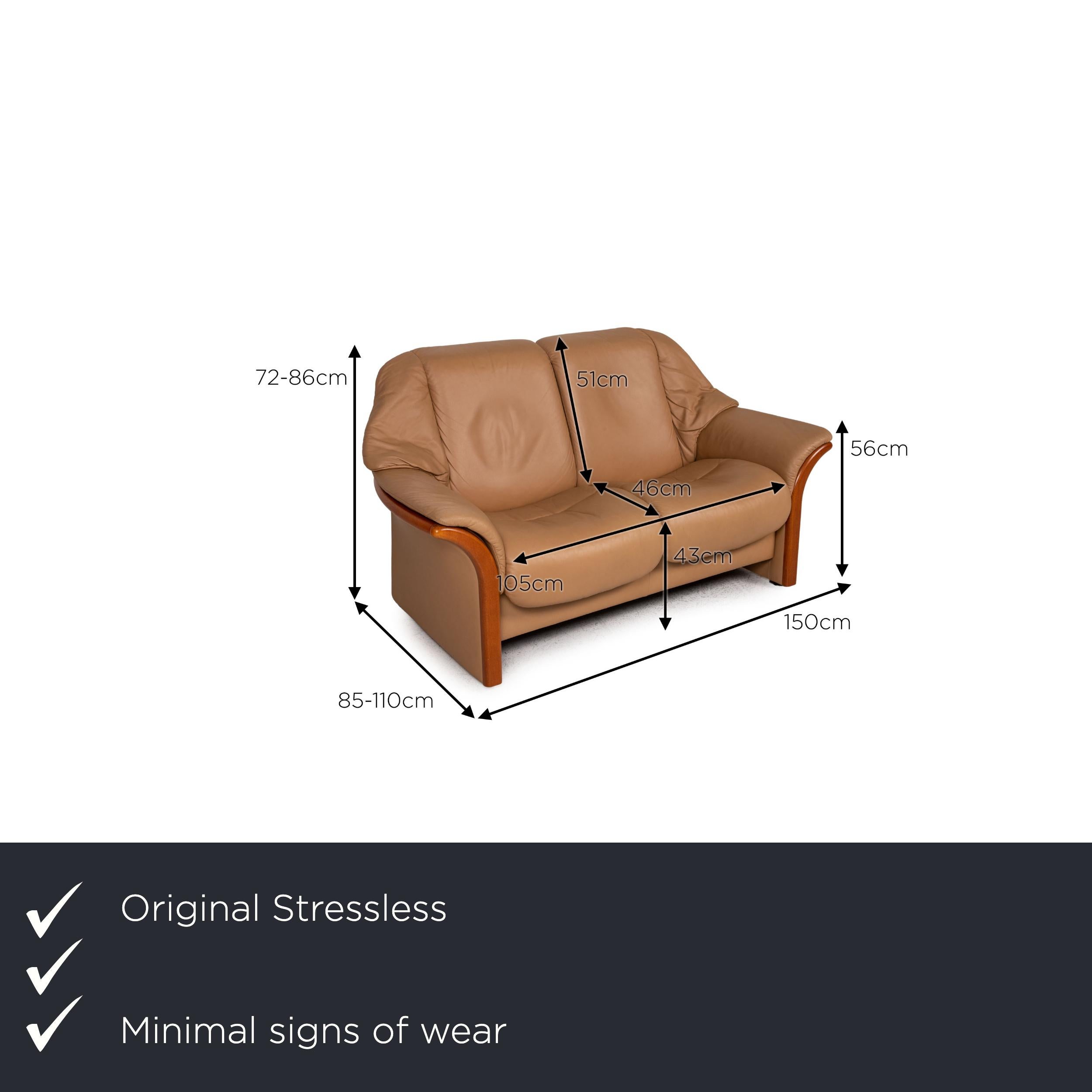 We present to you a Stressless Eldorado leather sofa beige two seater couch.

Product measurements in centimeters:

depth: 85
width: 150
height: 72
seat height: 43
rest height: 56
seat depth: 46
seat width: 105
back height: 51.

 