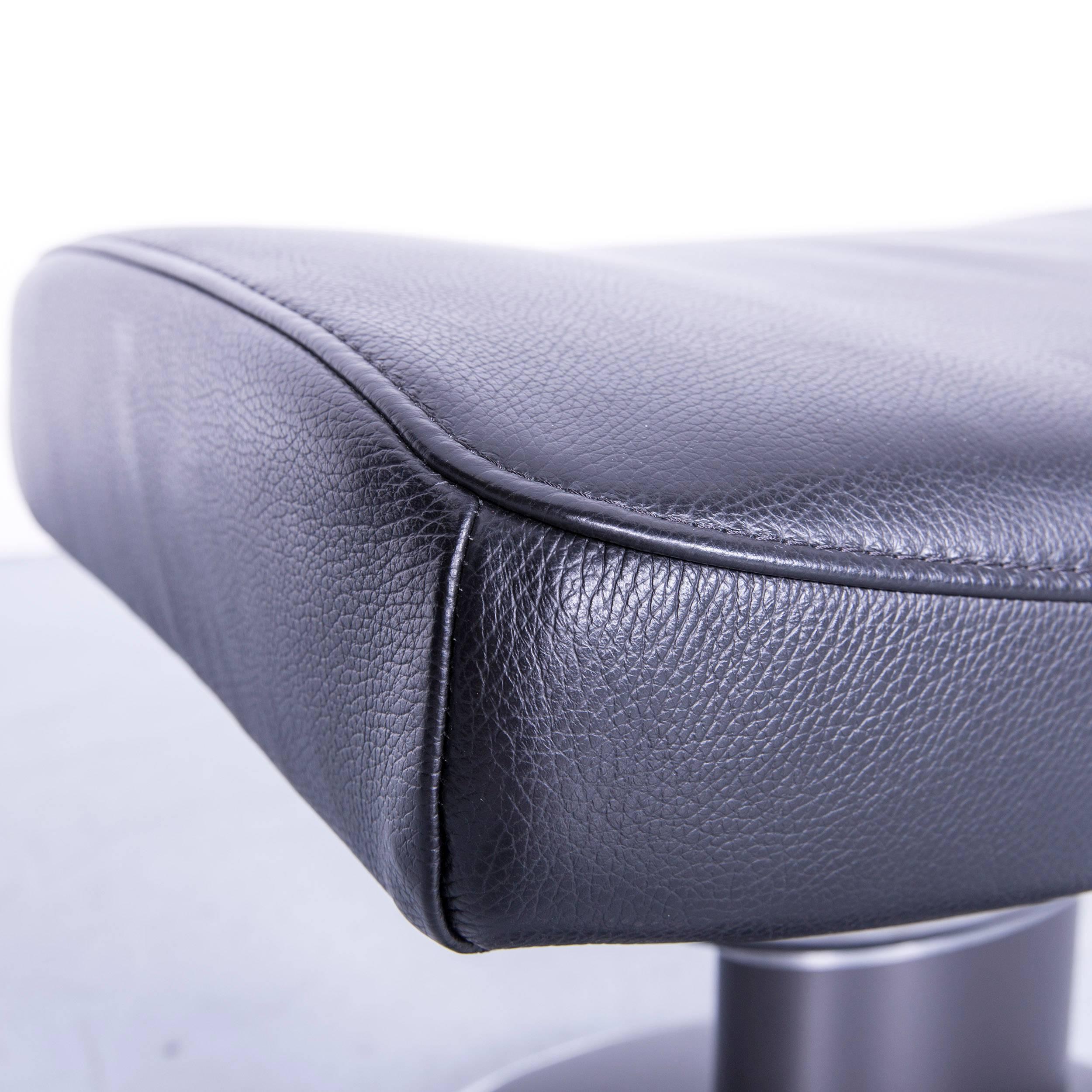 Fauteuil de bureau en cuir noir Stressless Jazz Designer avec pouf et fonctionnalité 9