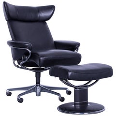 Fauteuil de bureau en cuir noir Stressless Jazz Designer avec pouf et fonctionnalité