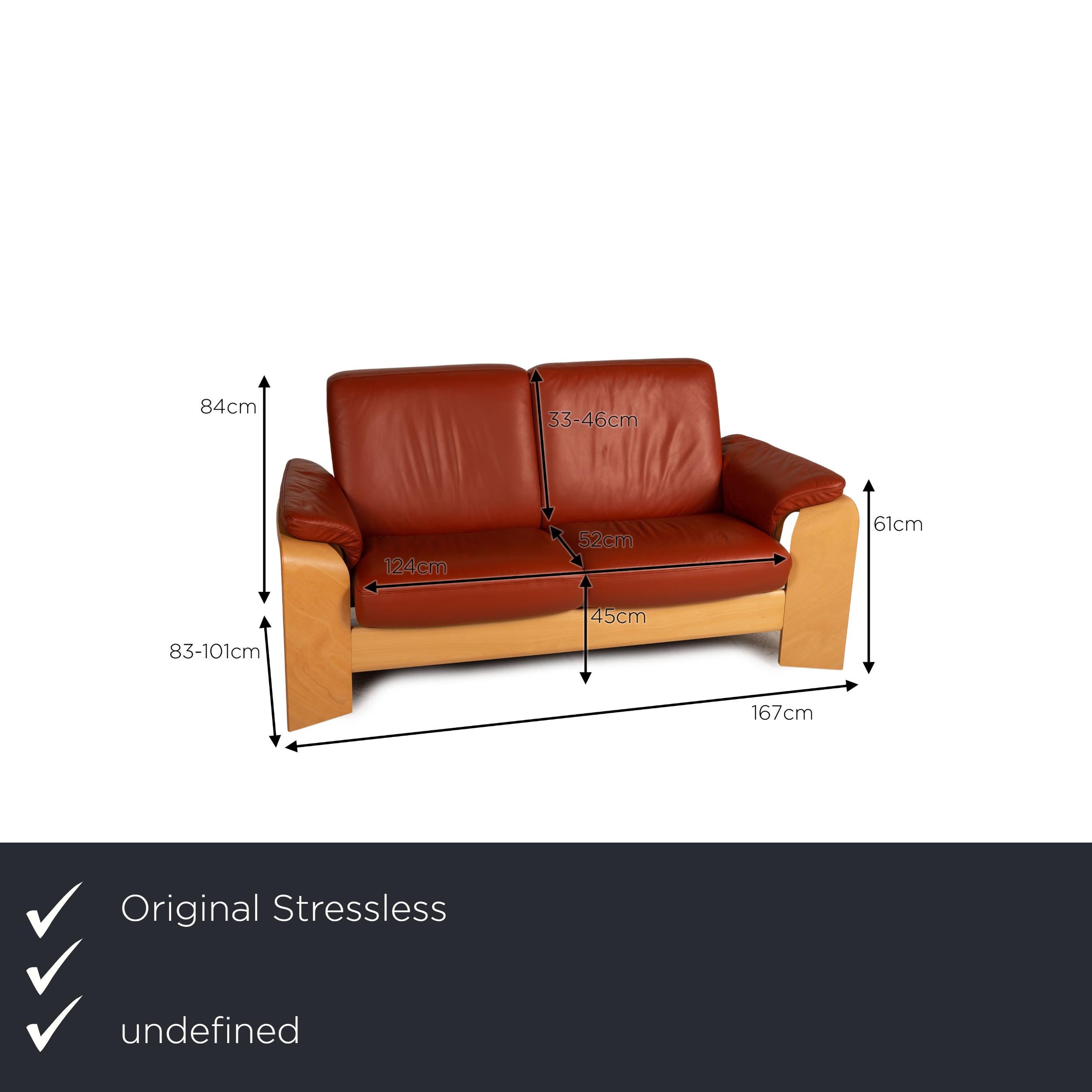 We present to you a Stressless Pegasus leather sofa set red 2x two-seater 1x side table.
  
 

 Product measurements in centimeters:
 

 depth: 83
 width: 167
 height: 98
 seat height: 45
 rest height: 61
 seat depth: 52
 seat width: