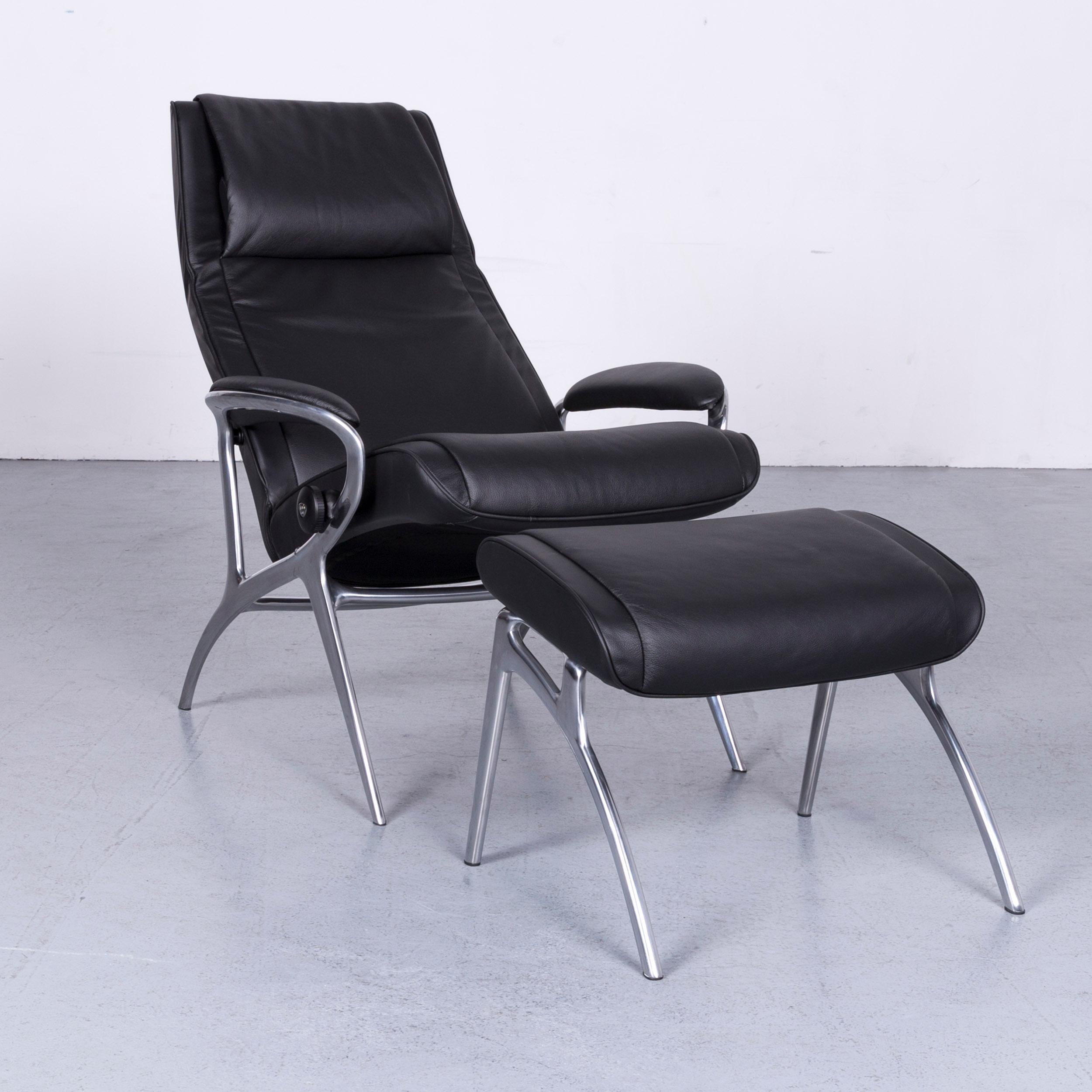We bring to you an Stressless You James designer leather armchair with foot-stool in black.