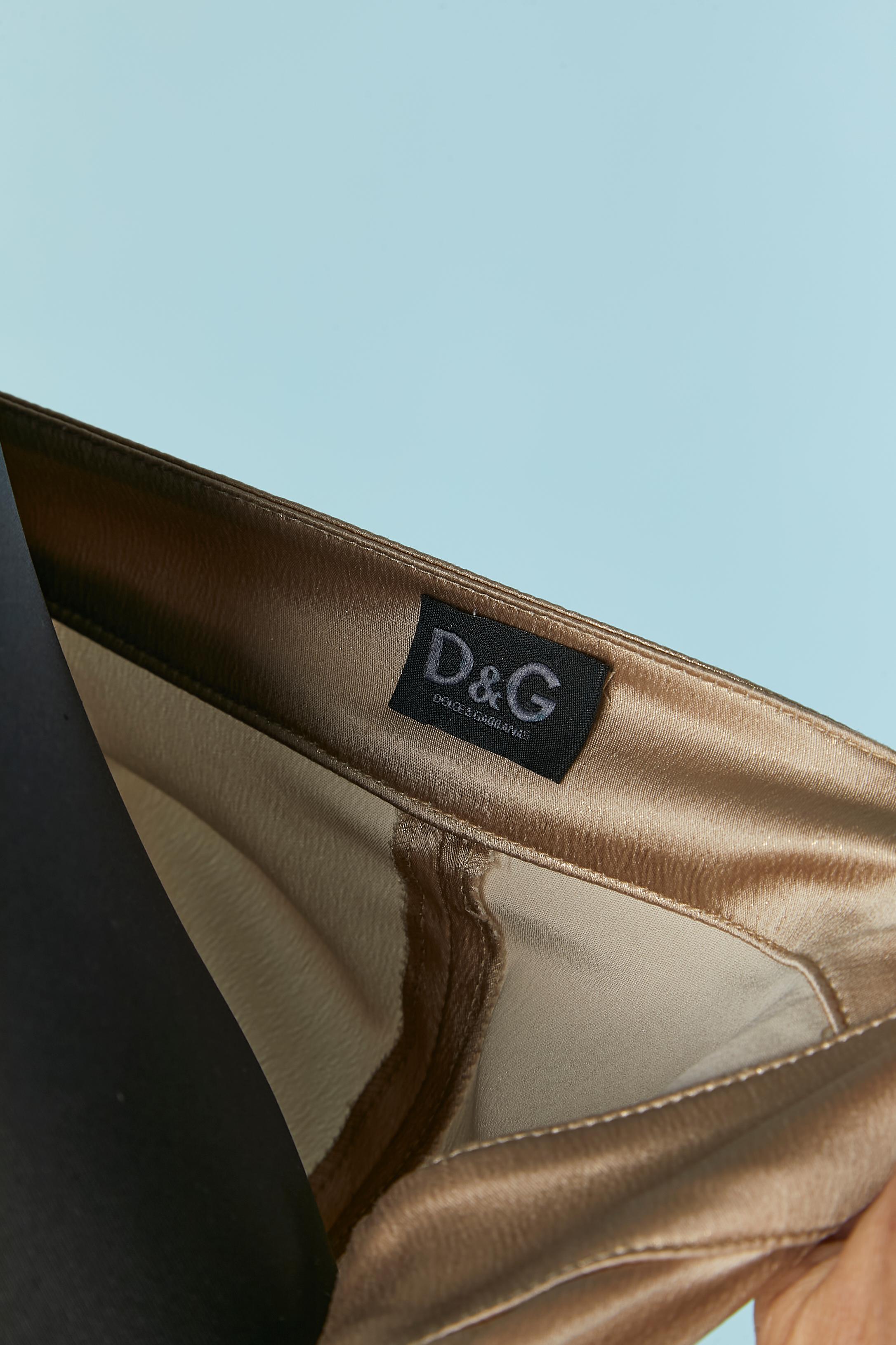 Pantalone beige elasticizzato con filo lurex oro D&G by DOLCE & GABBANA in vendita 1