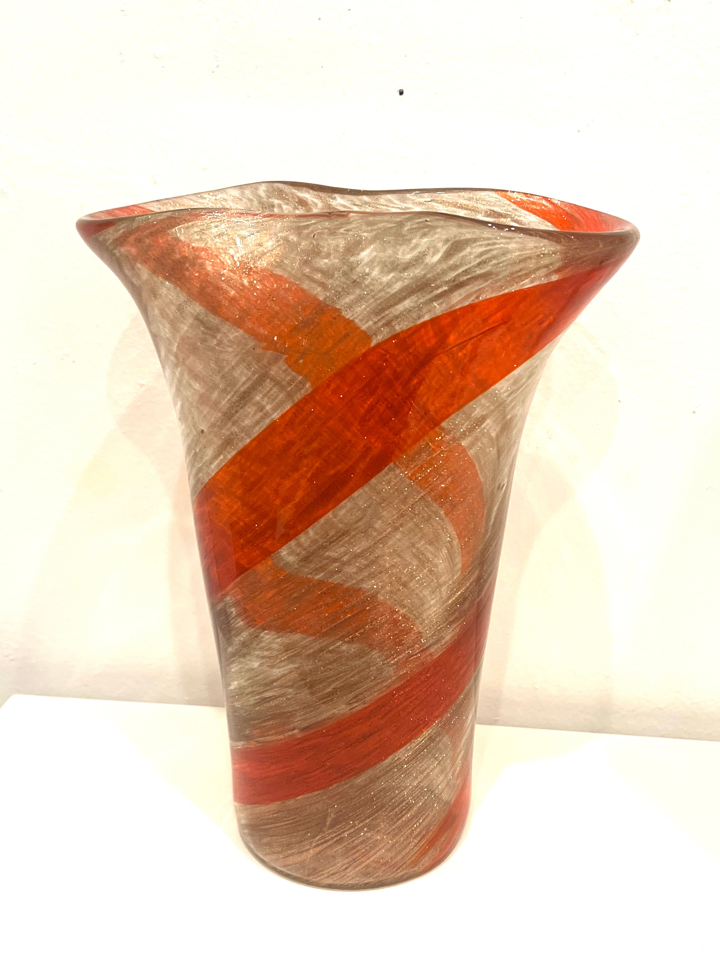 Stunning hand-blown glass vase with red spiral design by Fratelli Toso, Murano, Italy, circa 1950’s. The vase has a beautiful shape with aventurine gold & copper sparkles throughout the glass, which shimmers like jewels the vase has a hairline crack