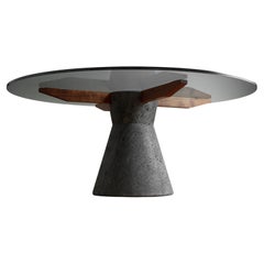 Table de salle à manger sculpturale Stricta en pierre de lave et plateau en verre par CMX