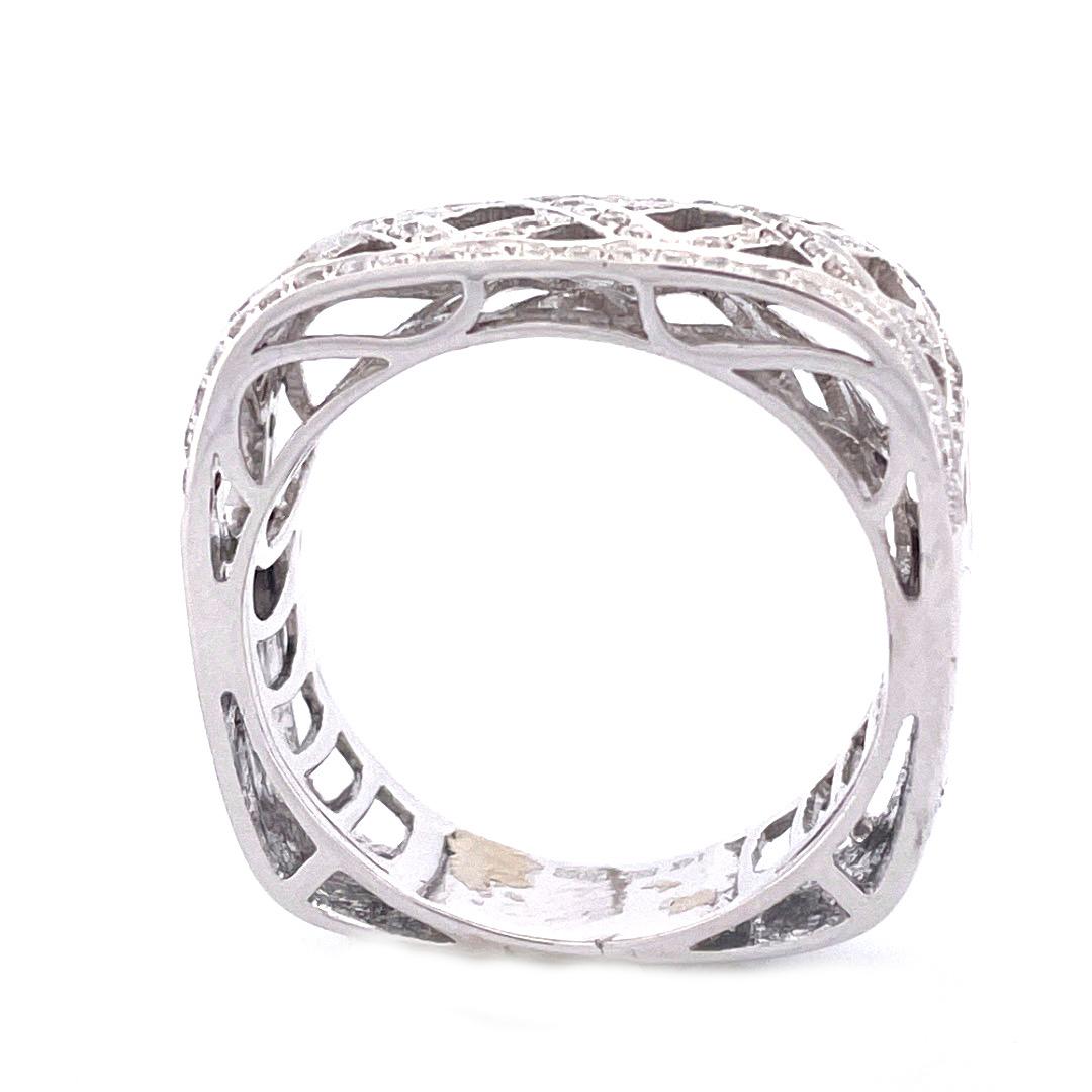 Striking 14k White Gold Square Diamond Ring 
Make a bold statement with this striking 14k white gold square diamond ring, showcasing mesmerizing zigzag patterns on the front side. The ring is adorned with diamonds totaling 0.54 carats.With a weight