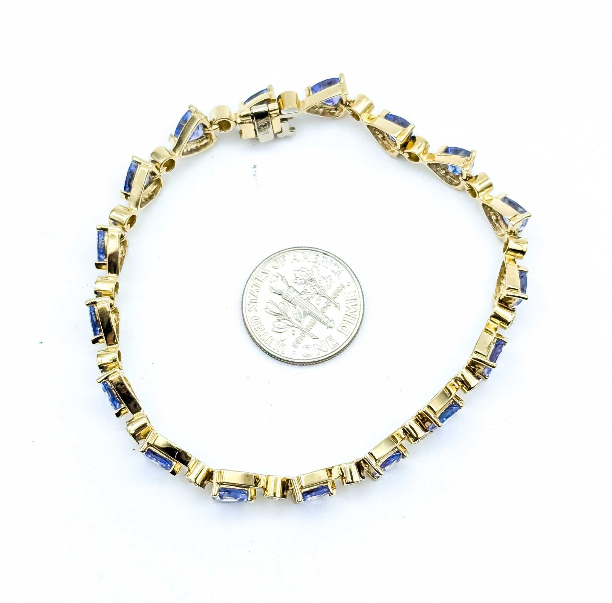 Llamativa pulsera de eslabones de oro amarillo de 14k con tanzanita y diamantes en venta 4