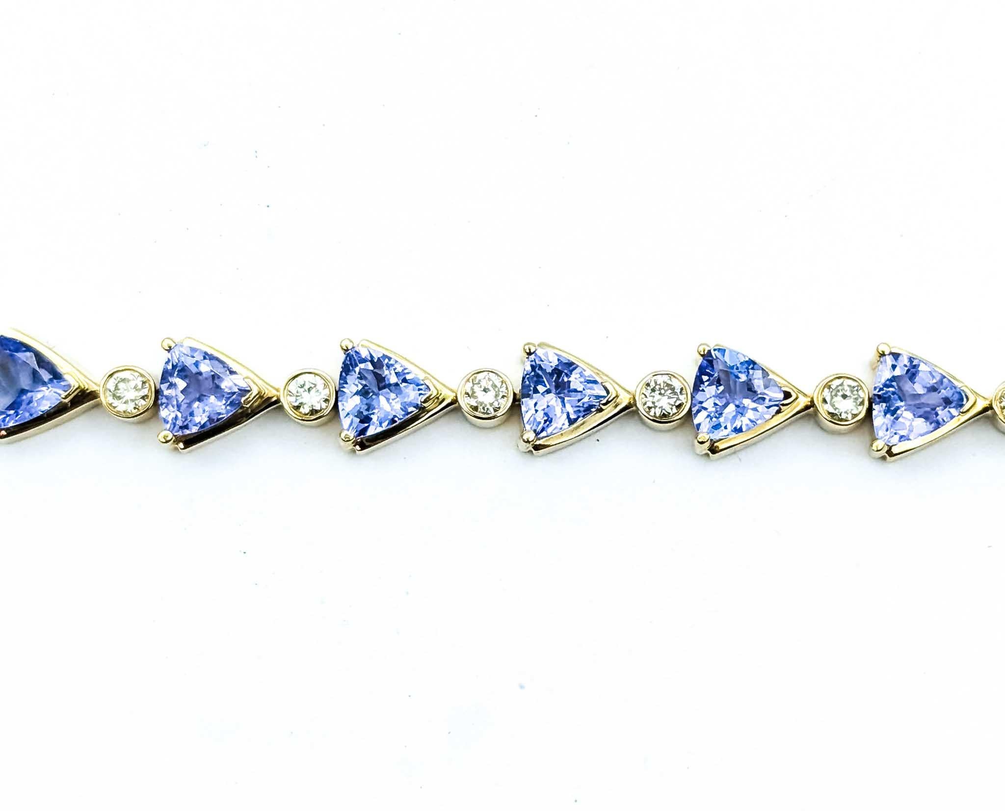 Llamativa pulsera de eslabones de oro amarillo de 14k con tanzanita y diamantes en Excelente estado para la venta en Bloomington, MN