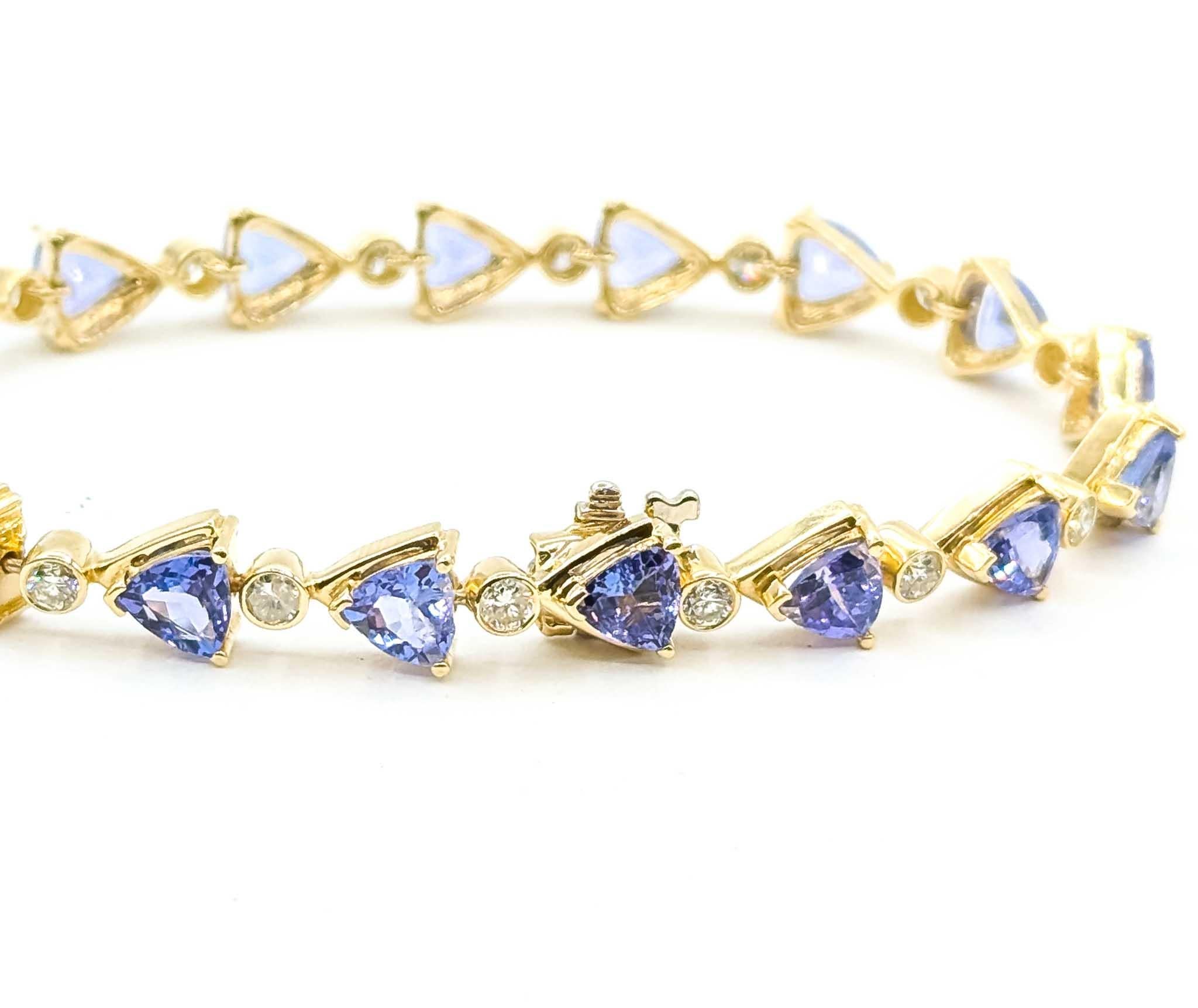De las mujeres Llamativa pulsera de eslabones de oro amarillo de 14k con tanzanita y diamantes en venta