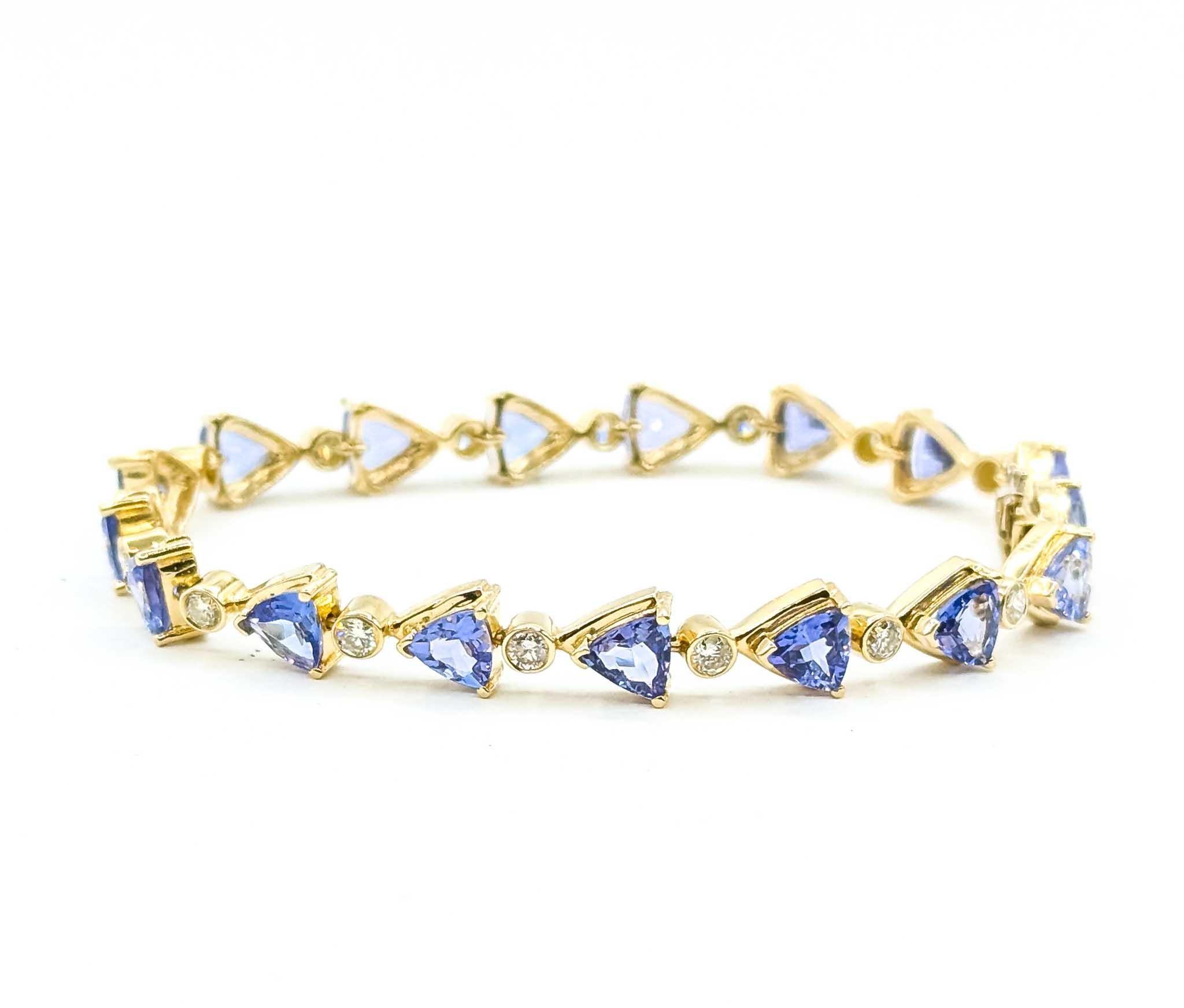 Llamativa pulsera de eslabones de oro amarillo de 14k con tanzanita y diamantes en venta 2