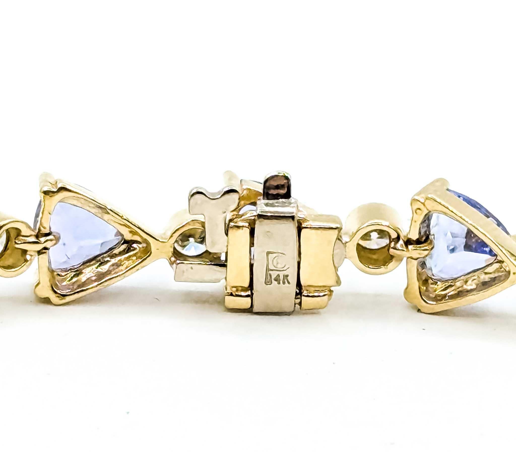 Llamativa pulsera de eslabones de oro amarillo de 14k con tanzanita y diamantes en venta 3